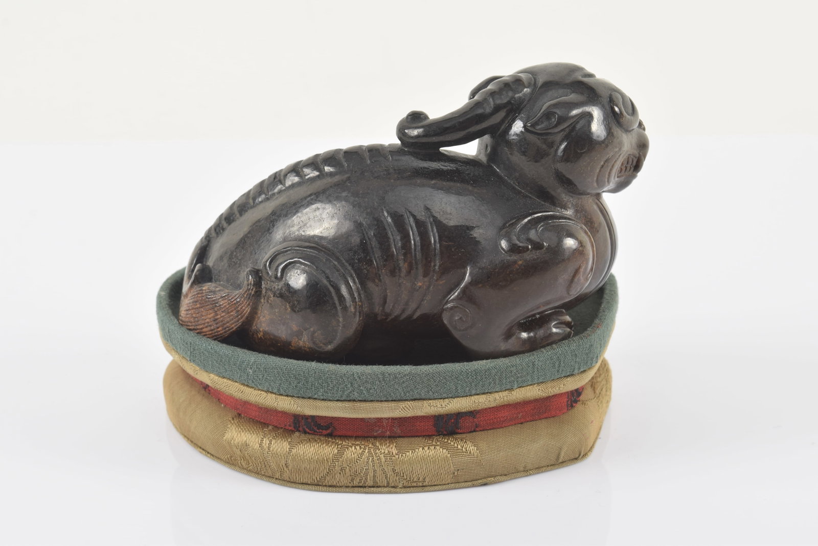 Jade luodan. China. Ming period (1368-1644). Fitted cloth stand. 4.25 x 2.5in of luodan. - 4