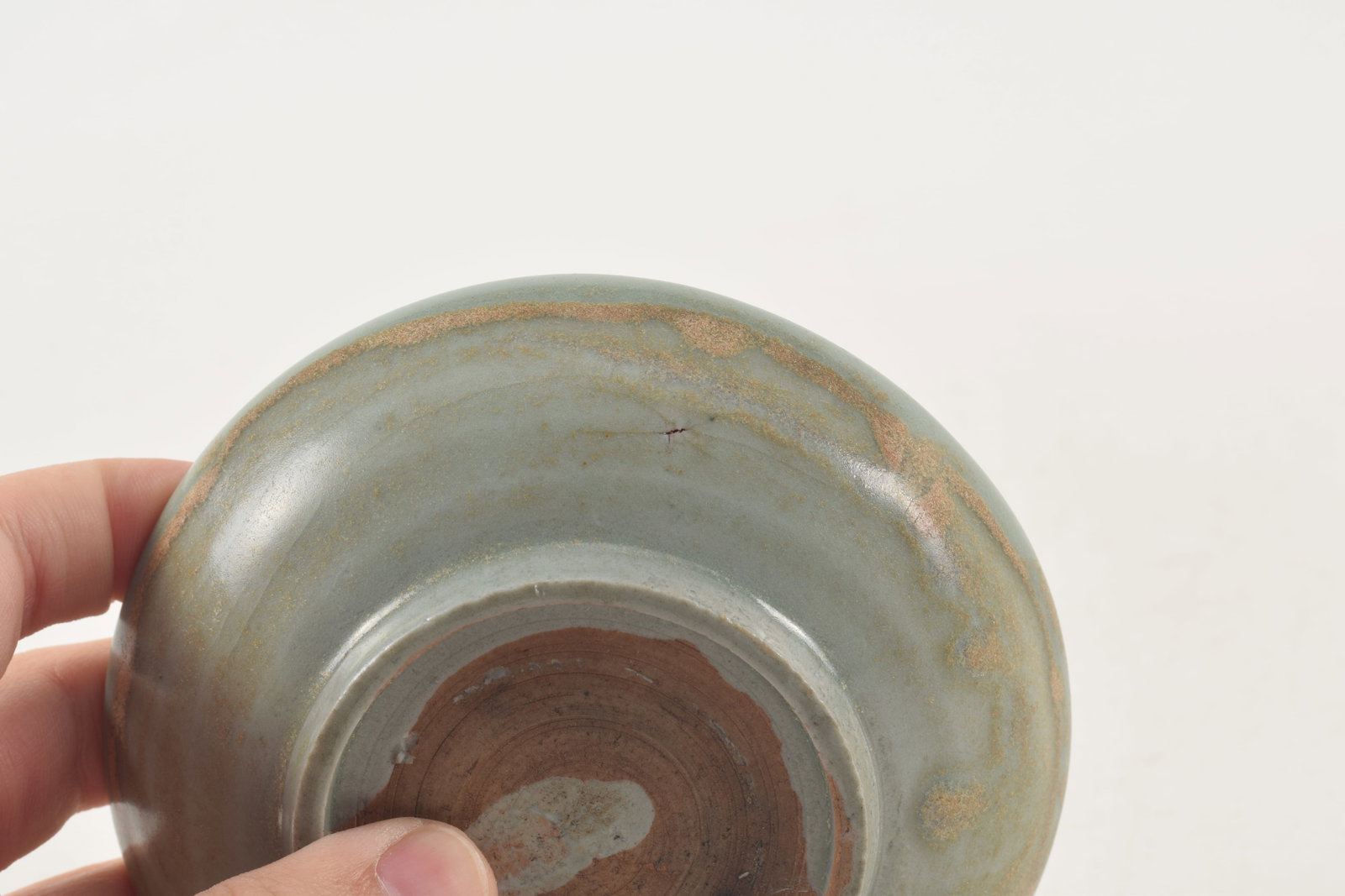 Early Chinese celadon dish with floral decoration, possibly Guan ware. Glaze hairlines and small - 4