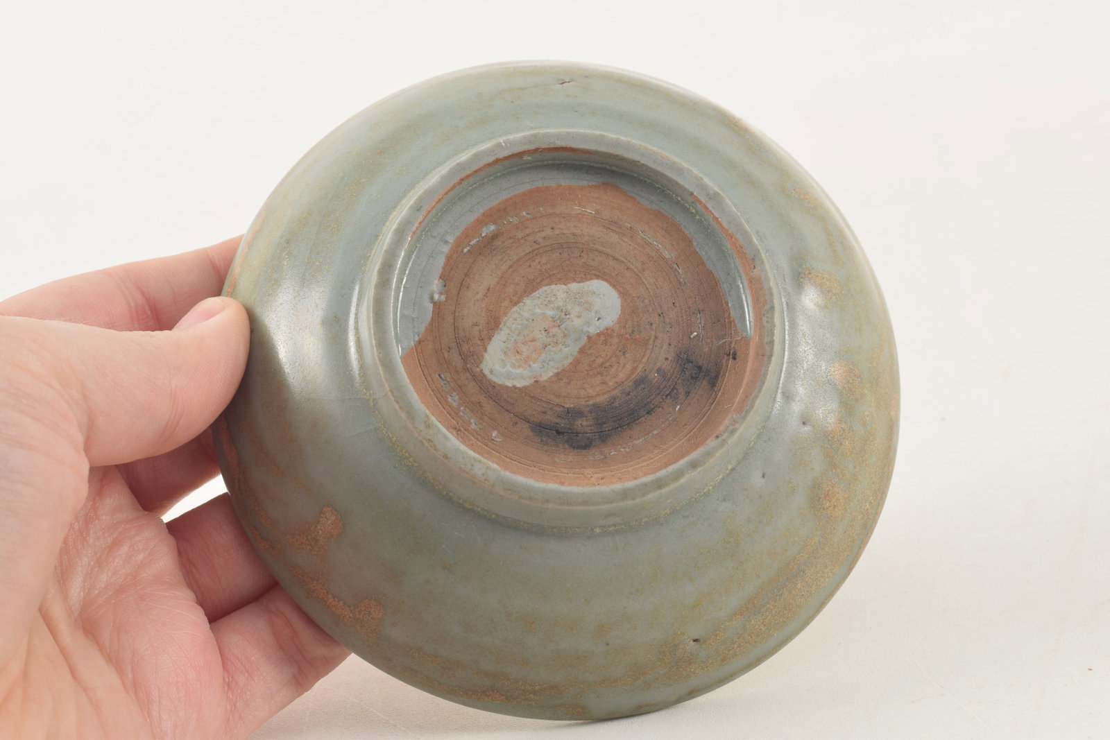 Early Chinese celadon dish with floral decoration, possibly Guan ware. Glaze hairlines and small - 5