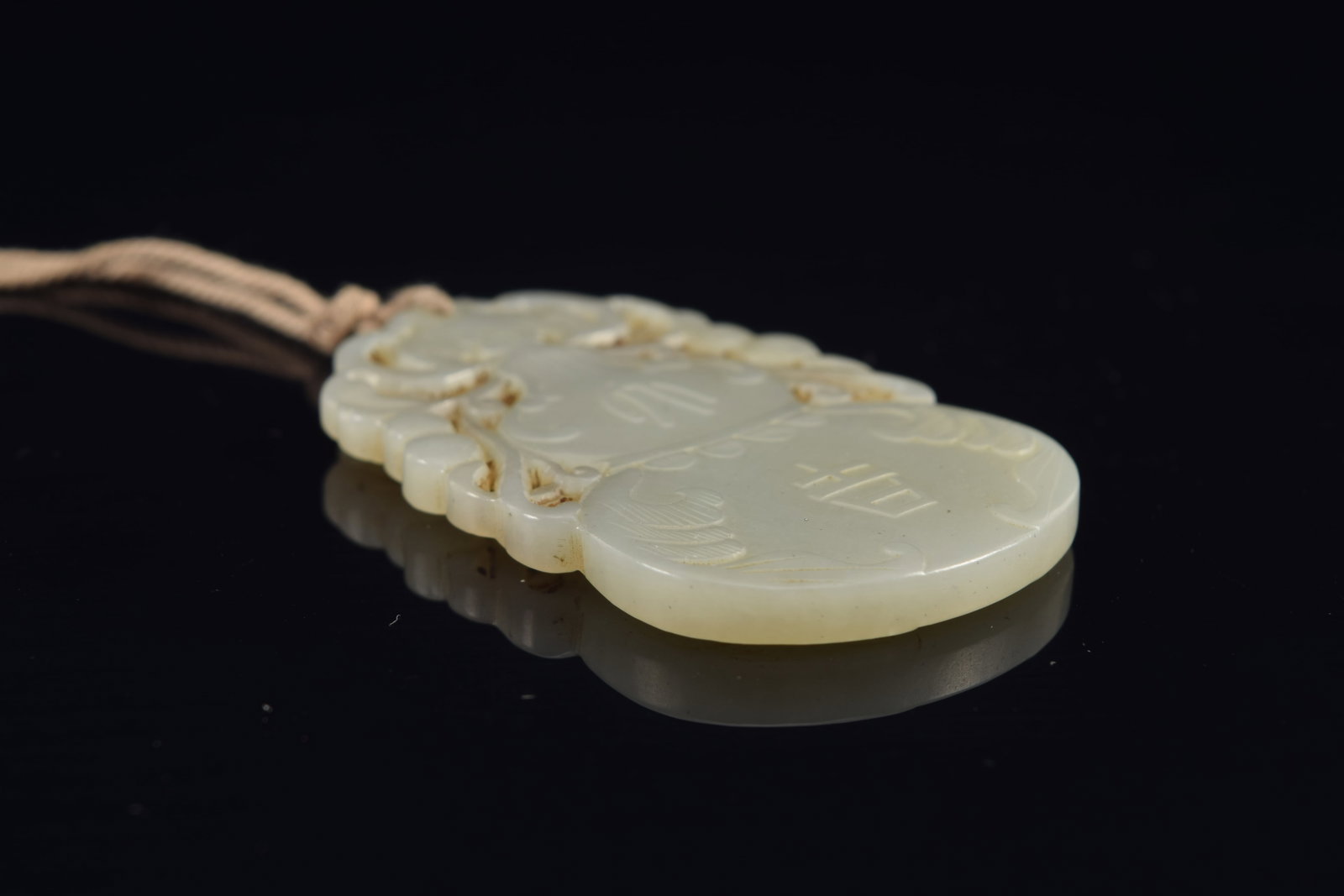 Jade pendant. China. 19th century. Double gourd form. 2.25in. - 4
