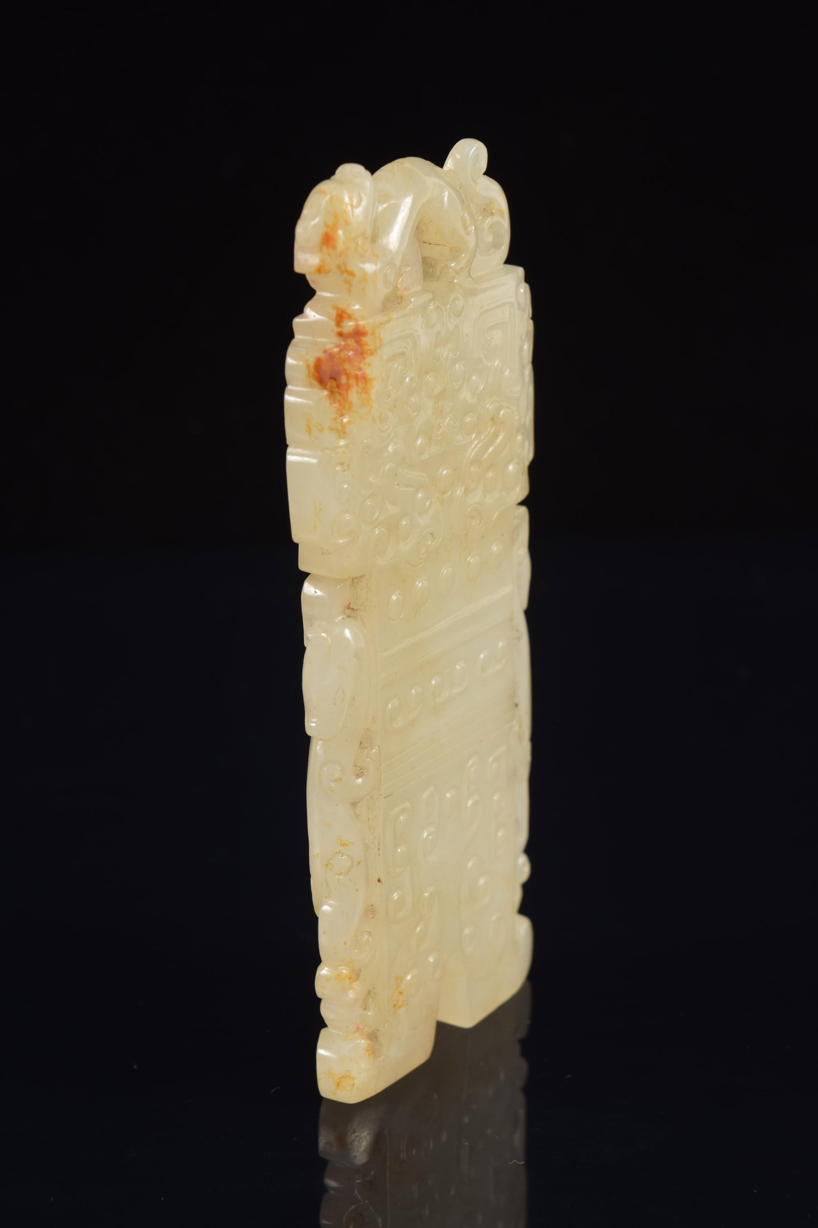 Jade pendant. China. Chien Lung period (1735-1796). Carving of archaic motifs. Grey colored stone - 2
