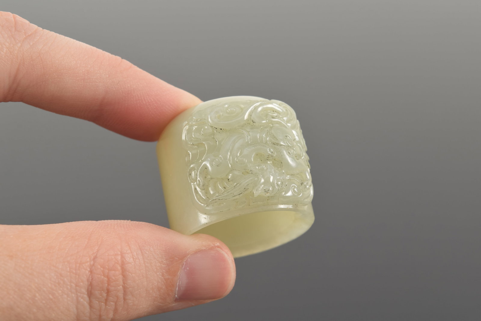 Jade archer's ring. China. 18th century. Surface carved with dragon and clouds. Grey-celadon color. - 7