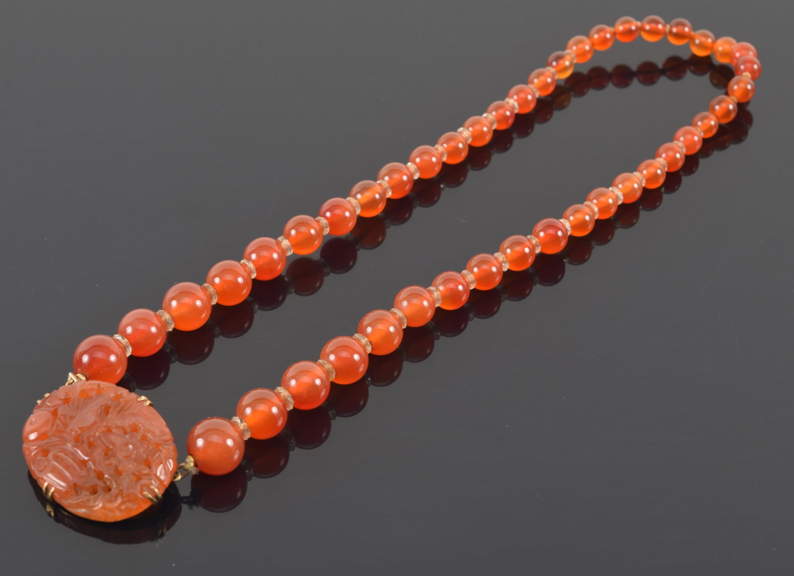 14K gold carved carnelian necklace. Graduated beads with reticulated carved floral plaque set in 14K (1 of 8)