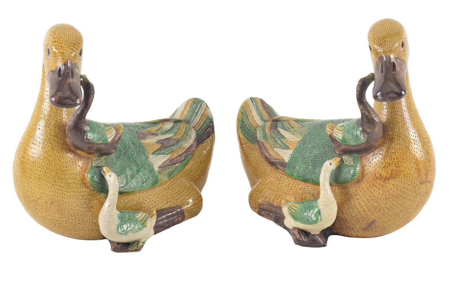 Pair of 19th century Chinese sancai goose figures with small geese climbing on bodies. 9 W x 8.5in: Pair of 19th century Chinese sancai goose figures with small geese climbing on bodies. 9 W x 8.5in H.