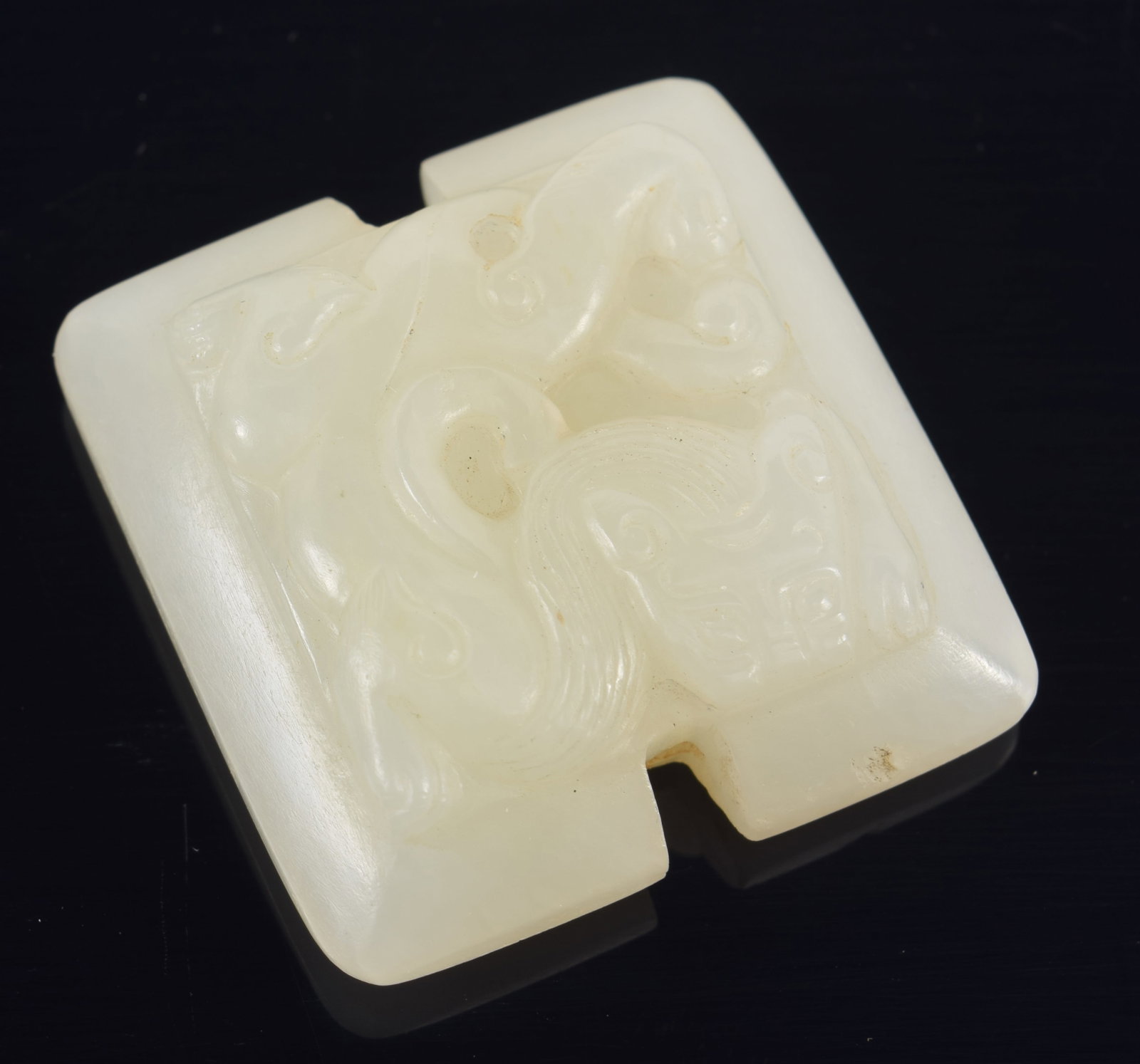 Jade pendant. China. 18th century. Surface carved with chih lung. 1.5in. (1 of 6)