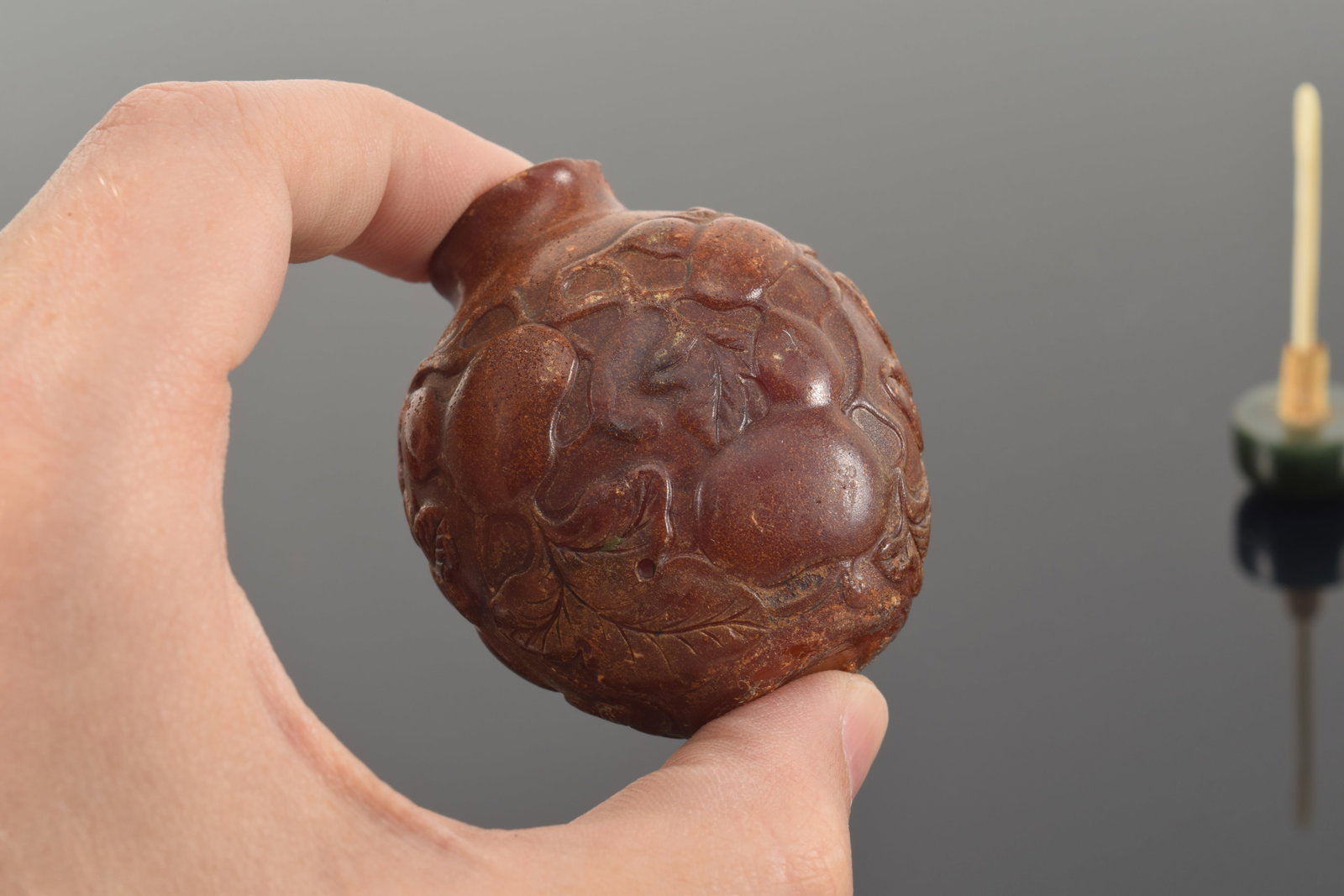 19th century Chinese carved amber snuff bottle. Allover fruit decoration. Chips around top rim. - 7