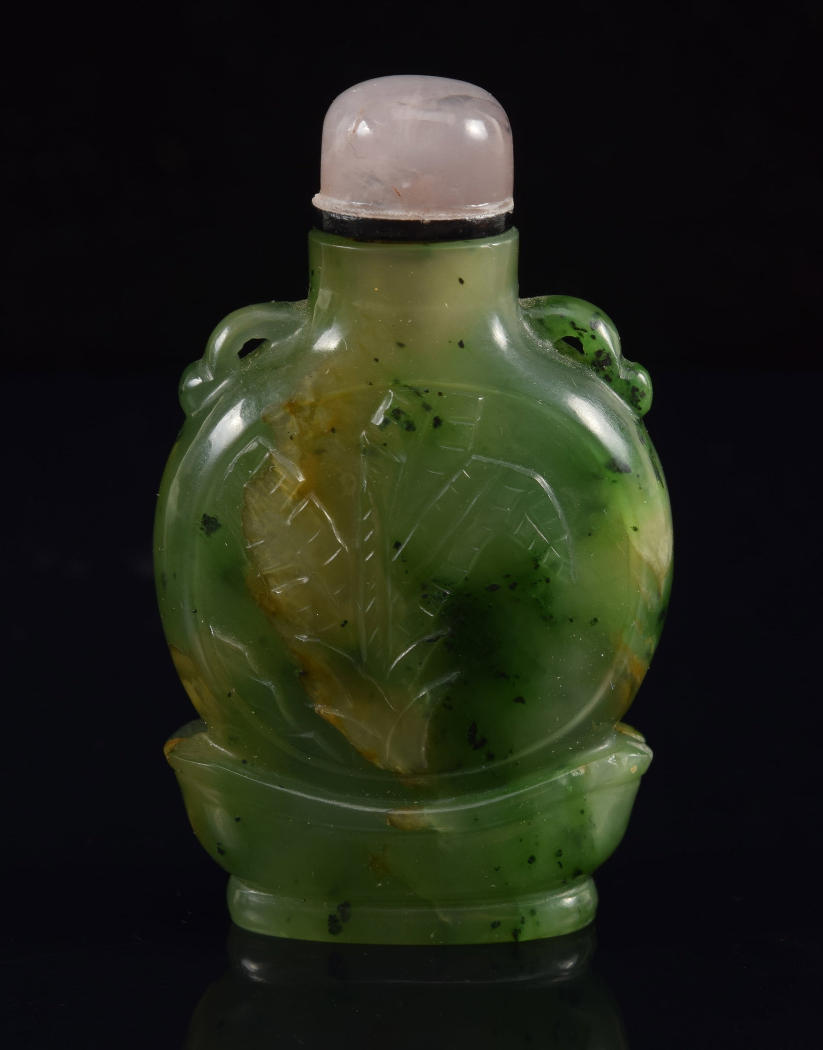 Chinese carved jade snuff bottle. 19th/20th century. Rose quartz stopper. Moon flask on stand form: Chinese carved jade snuff bottle. 19th/20th century. Rose quartz stopper. Moon flask on stand form with landscape scenes. 2.25in high.