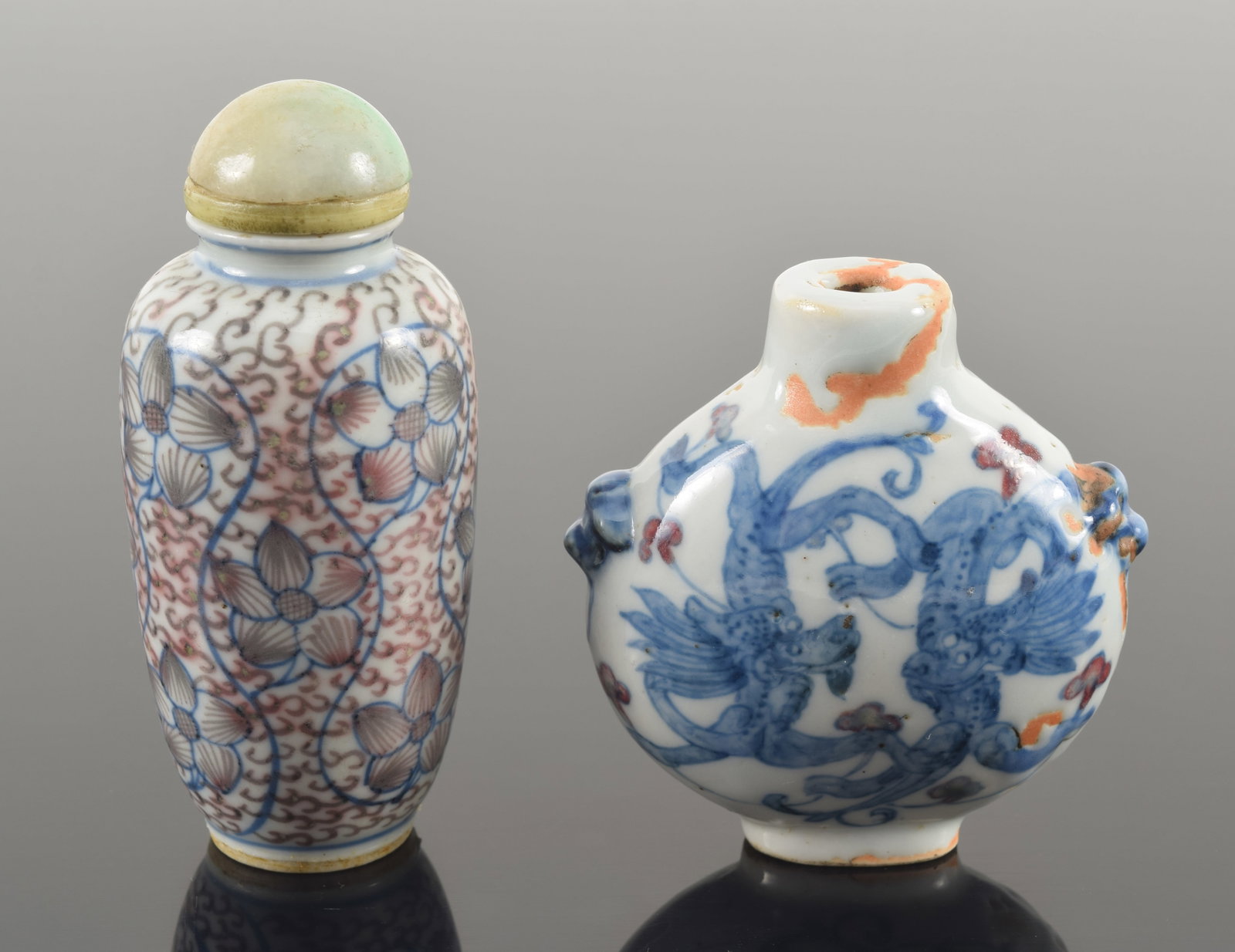 2 19th century Chinese porcelain snuff bottles. 1) Blue and white with underglaze red decoration. (1 of 6)