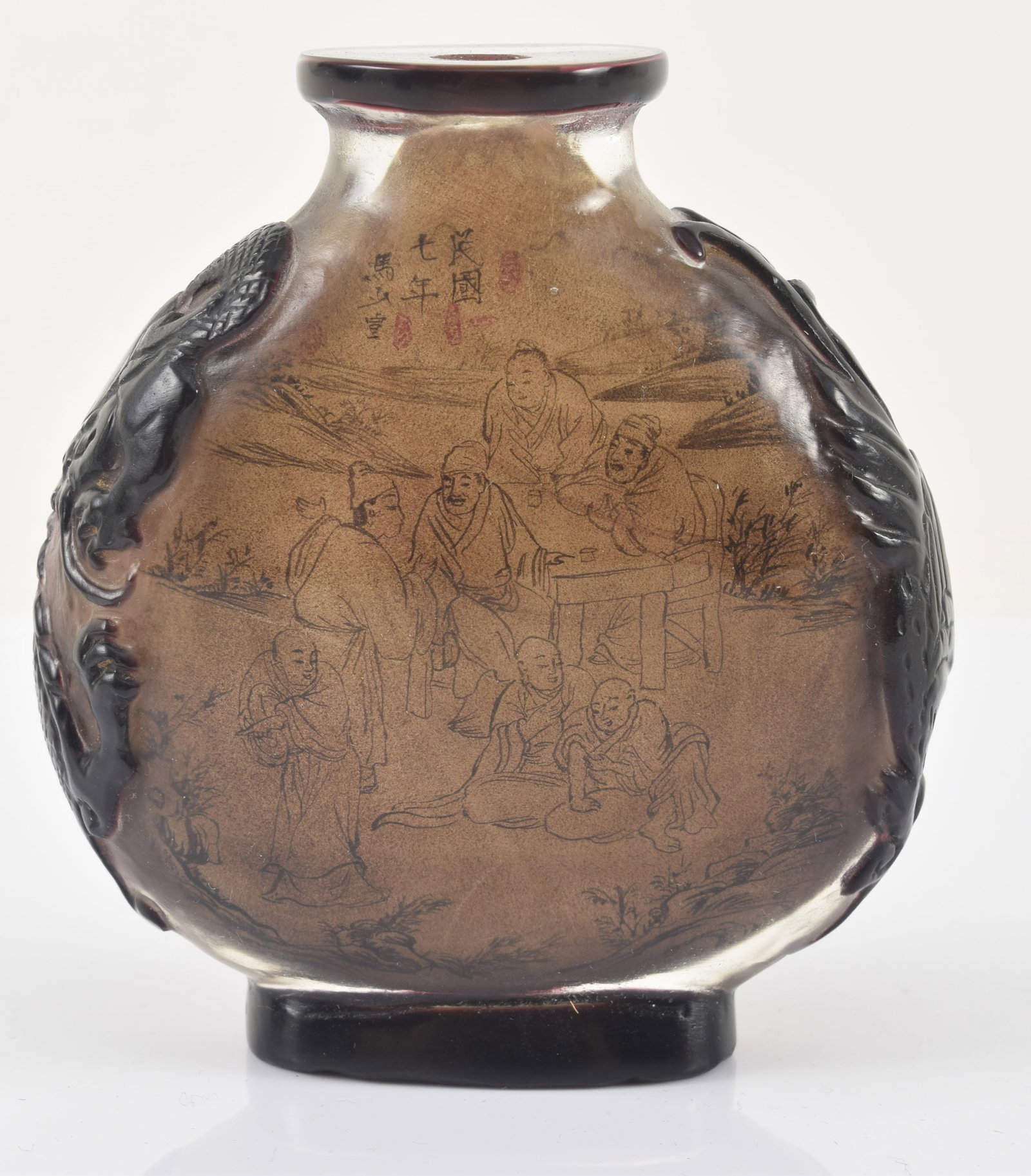 Large interior painted glass snuff bottle. China. 19th/20th century. Scholars in a landscape.: Large interior painted glass snuff bottle. China. 19th/20th century. Scholars in a landscape. Inscription with seals. Sides carved with phoenixes. 3.5in high.