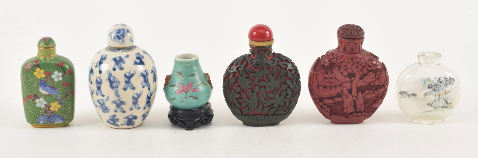 Lot of 6 Chinese snuff bottles. 19th/20th centuries. To include: Blue and white Hundred Children (1 of 5)