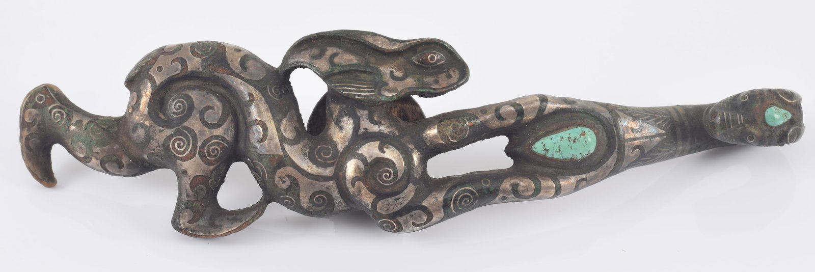 Bronze garment hook. China. Waring states period. Bronze inlaid with silver and turquoise. 6in. (1 of 8)