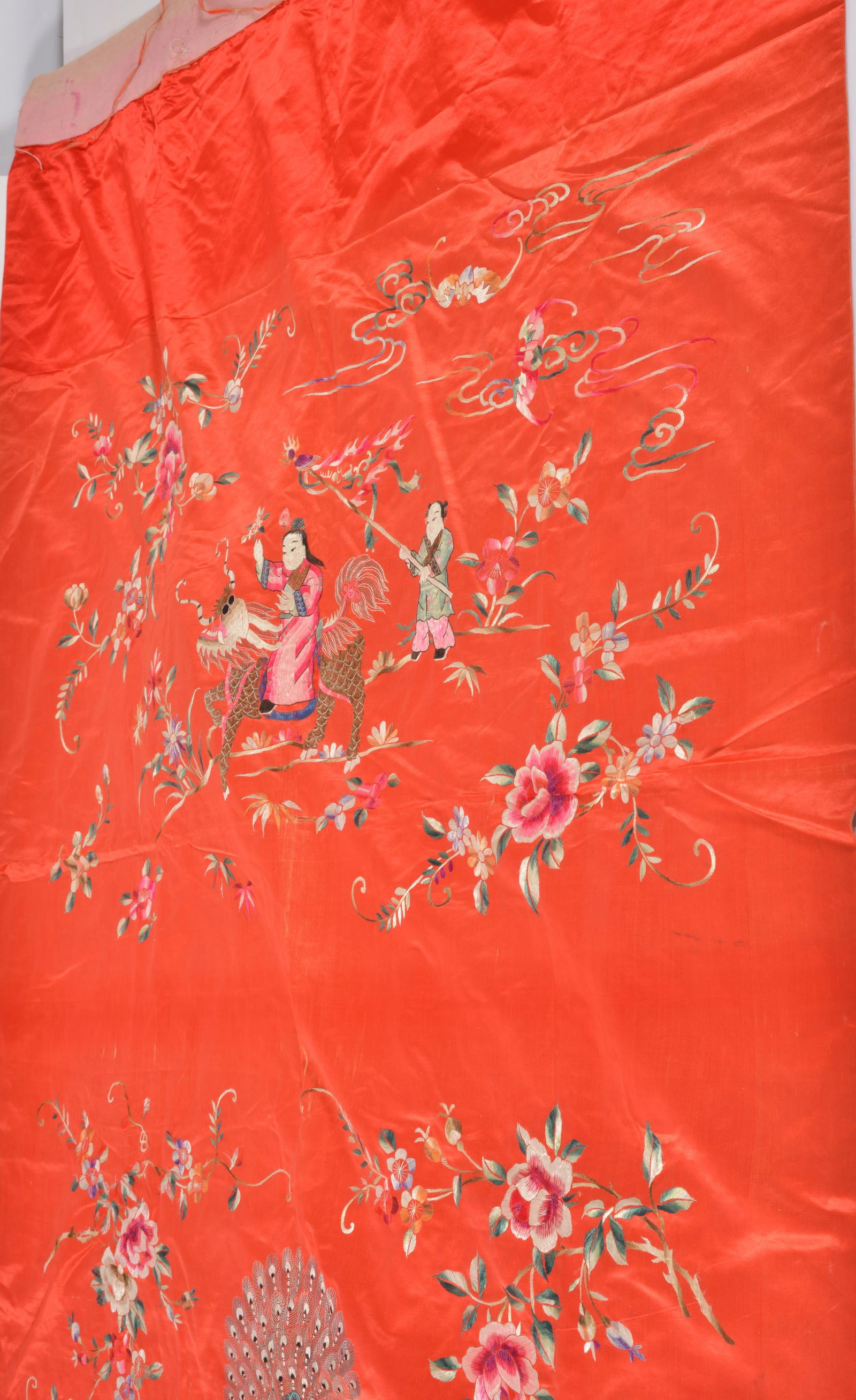 Chinese silk embroidered textile. Figural and floral decoration on a red ground. 72 x 46in. - 3