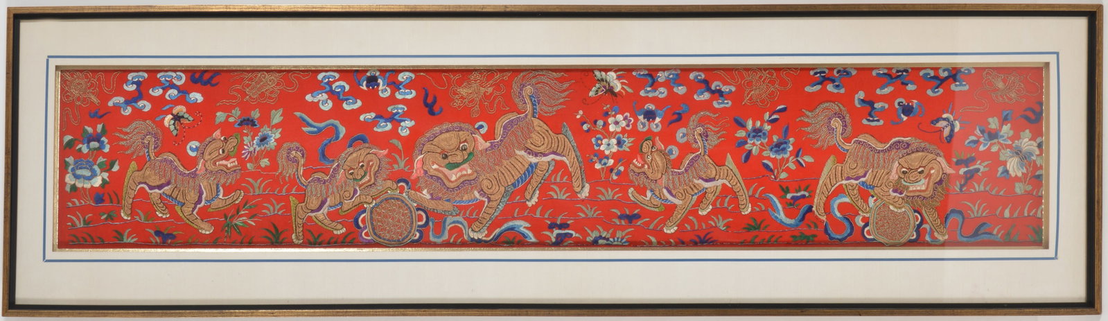 Chinese textile. Early 20th century. Silk and gold thread embroidery on red felt ground. Raised foo (1 of 4)