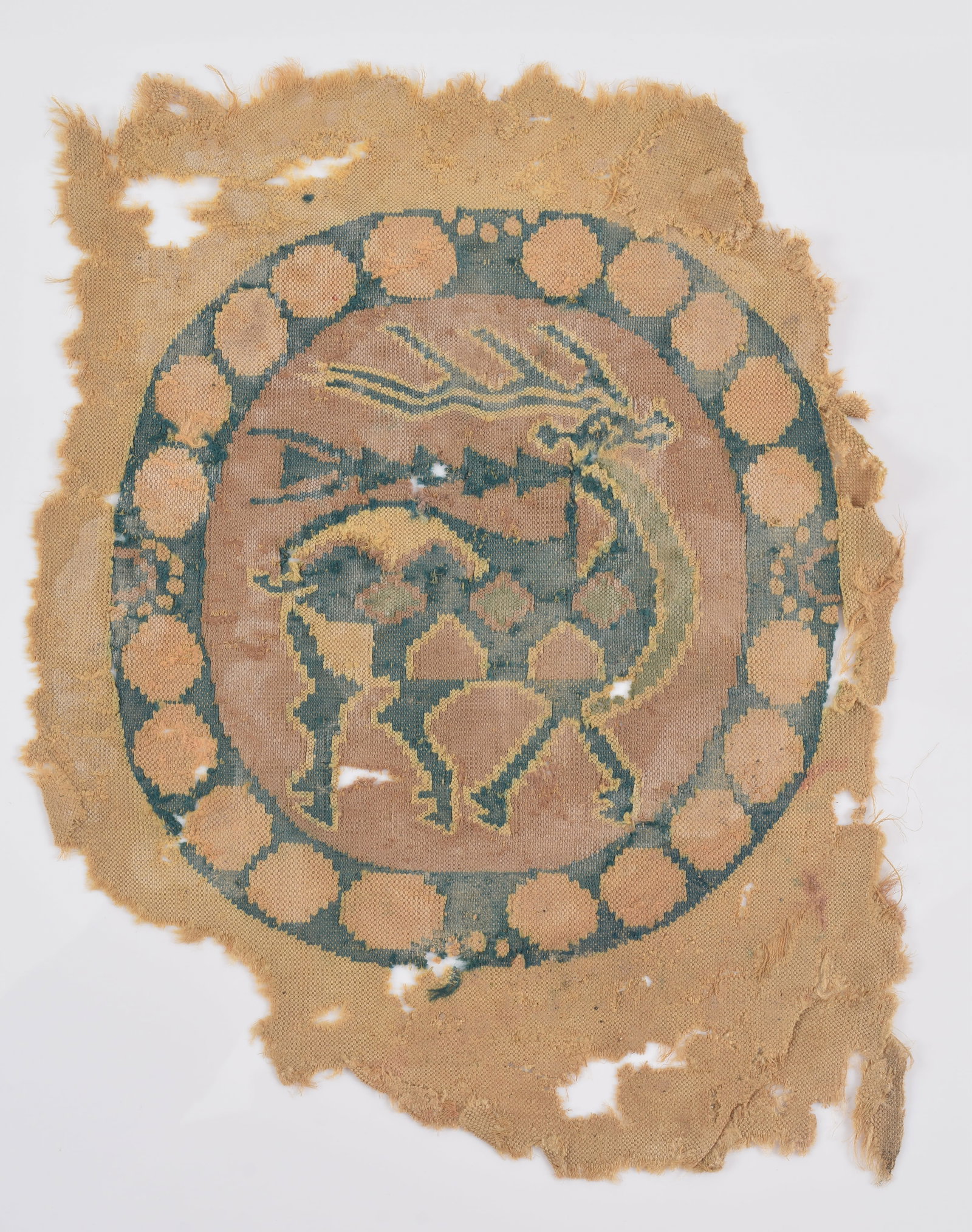 Textile fragment. China. Tang period (618-920). Tapestry weave with a roundel of a stag. 8 x 5.5in.: Textile fragment. China. Tang period (618-920). Tapestry weave with a roundel of a stag. 8 x 5.5in.