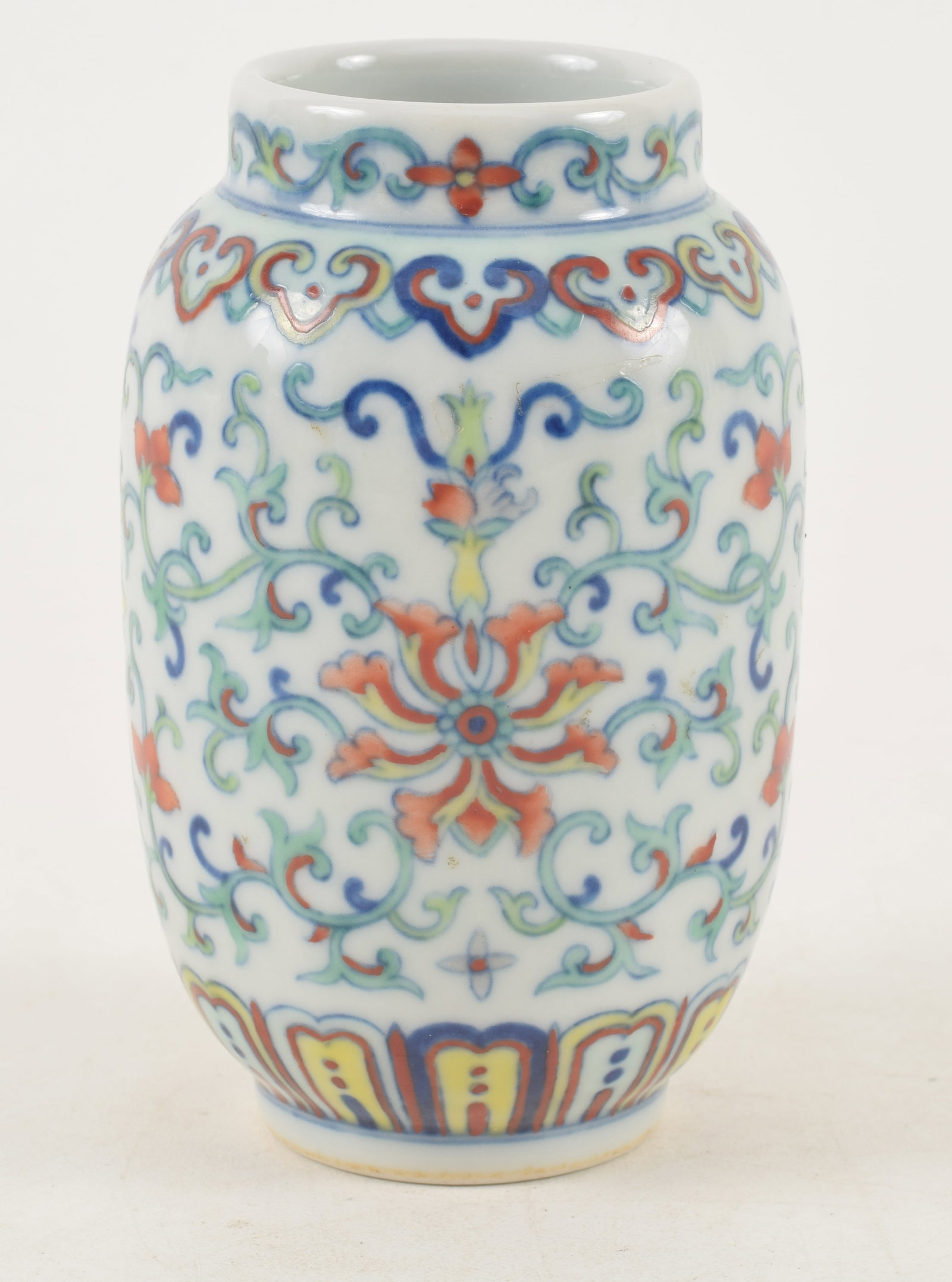 20th century Chinese doucai porcelain vase with floral scrolling decoration. Hallmarked on base. (1 of 5)
