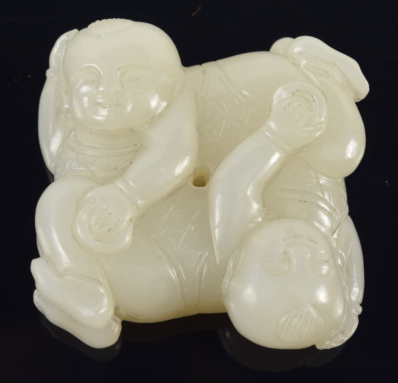 Jade pendant. China. 18th century. Acrobatic of 2 little boys. 1.5in.: Jade pendant. China. 18th century. Acrobatic of 2 little boys. 1.5in.