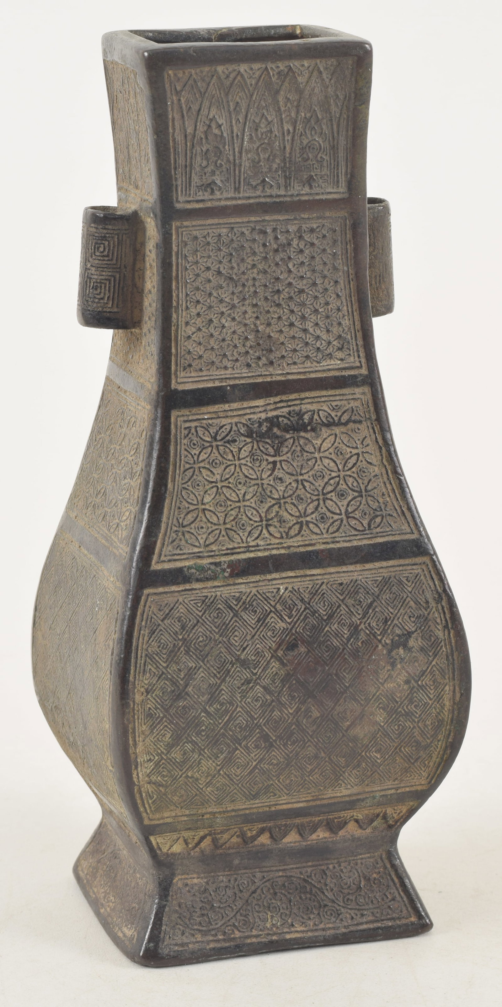 Bronze vase. China. Probably Sung period, 12th century. Archaic Hu form. Surface covered in various (1 of 6)