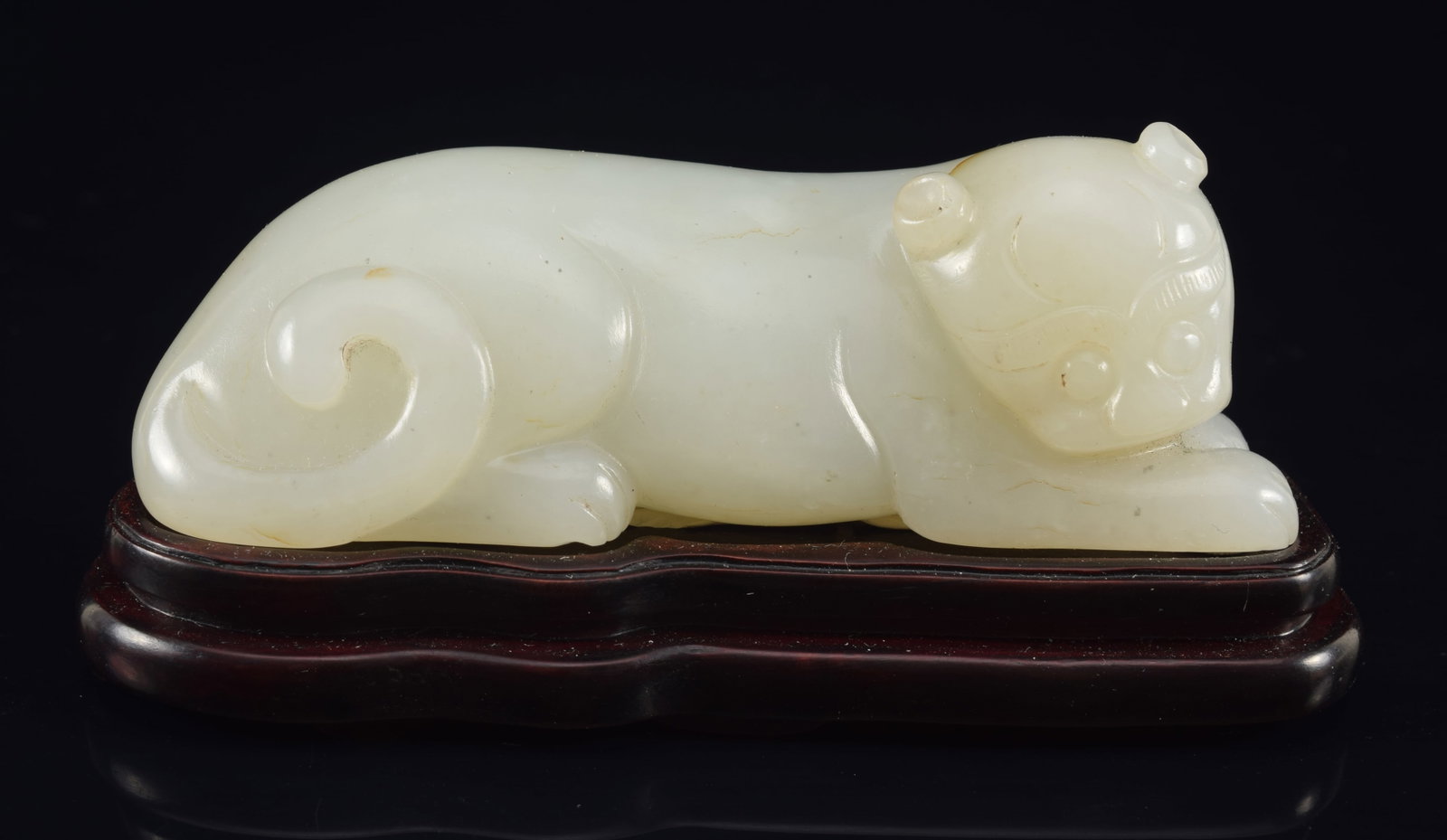 Jade tiger. Pure white color. China. 18th century. Fitted stand. 3.5in length.: Jade tiger. Pure white color. China. 18th century. Fitted stand. 3.5in length.