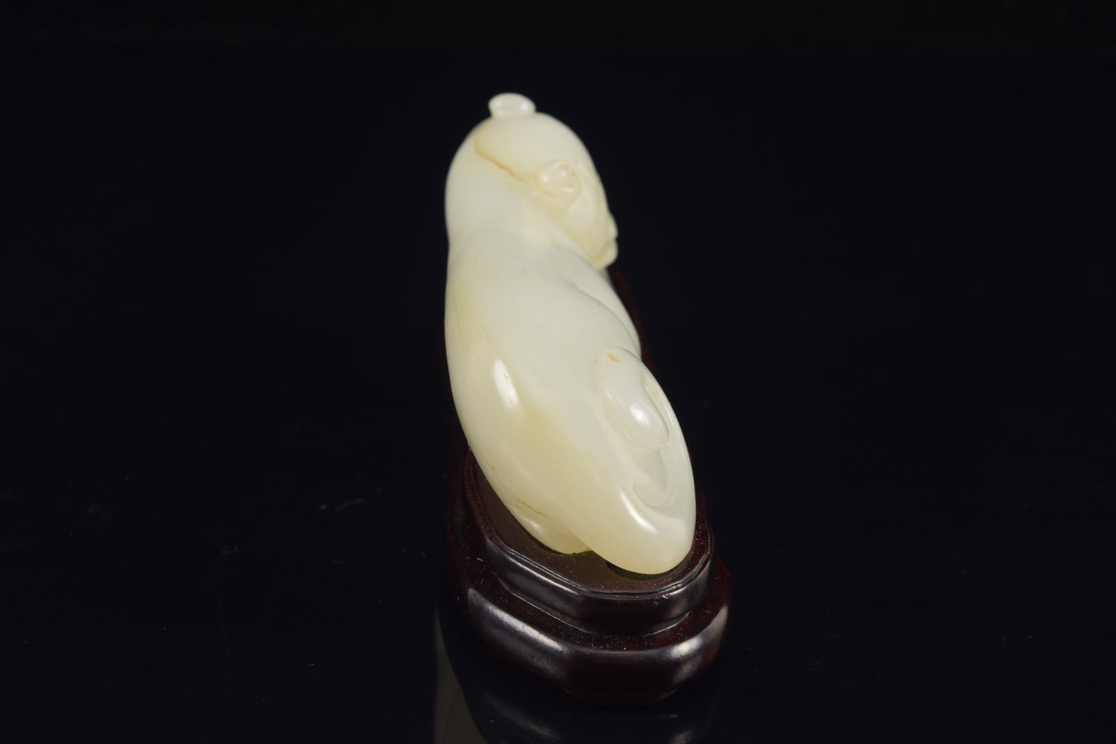 Jade tiger. Pure white color. China. 18th century. Fitted stand. 3.5in length. - 4