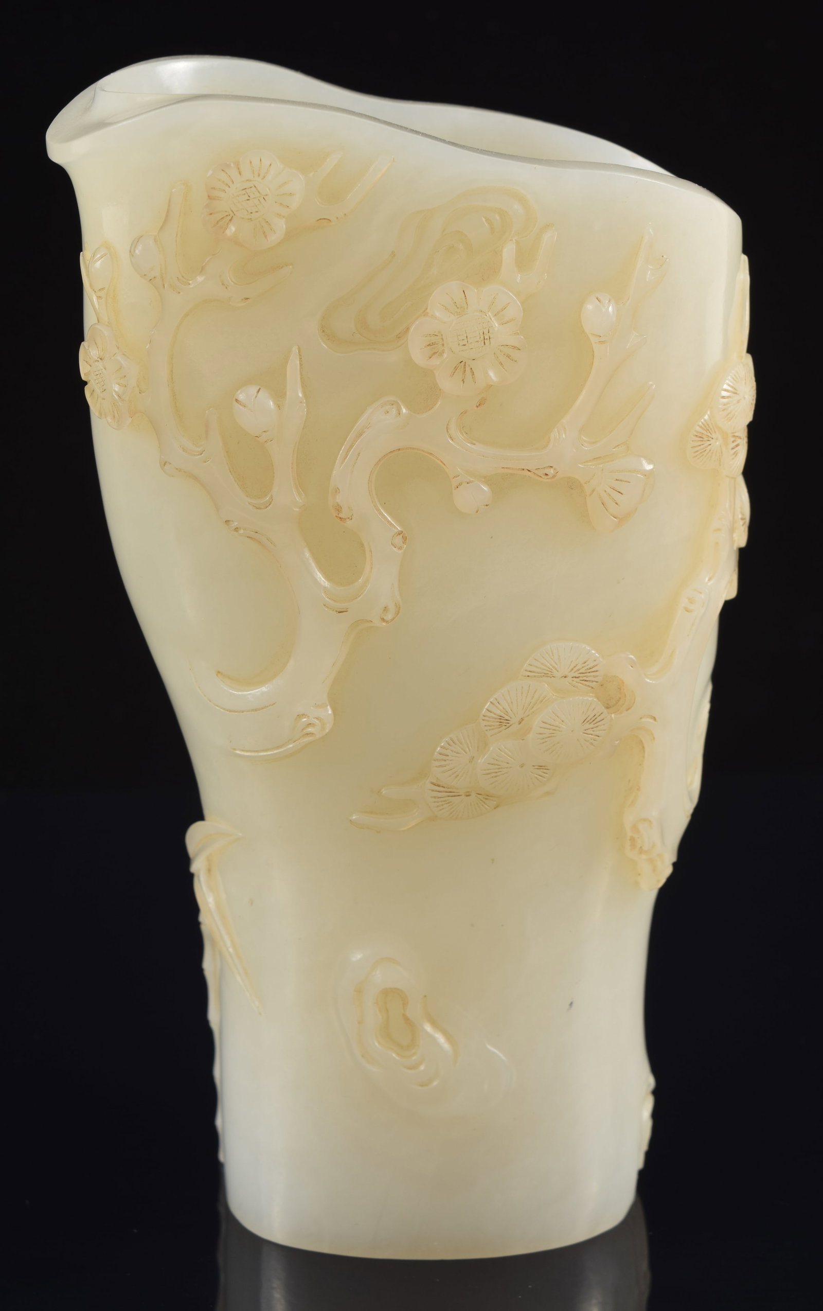 Jade rhyton. China. 18th century. Surface carved with the three friends. 5.75in high. (1 of 8)