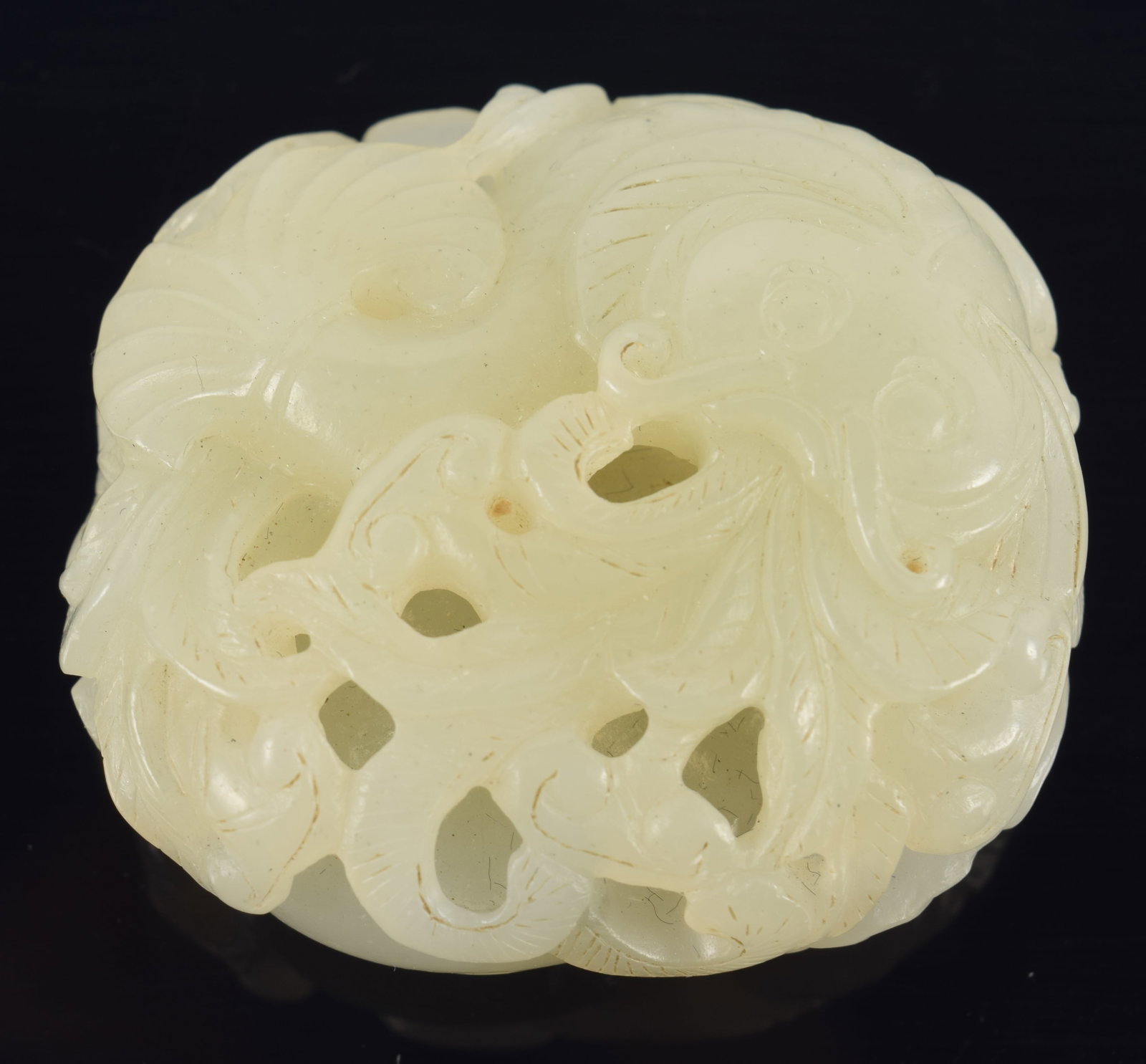 Jade carving. China. 18th century. Catfish in foliage. 2in.: Jade carving. China. 18th century. Catfish in foliage. 2in.