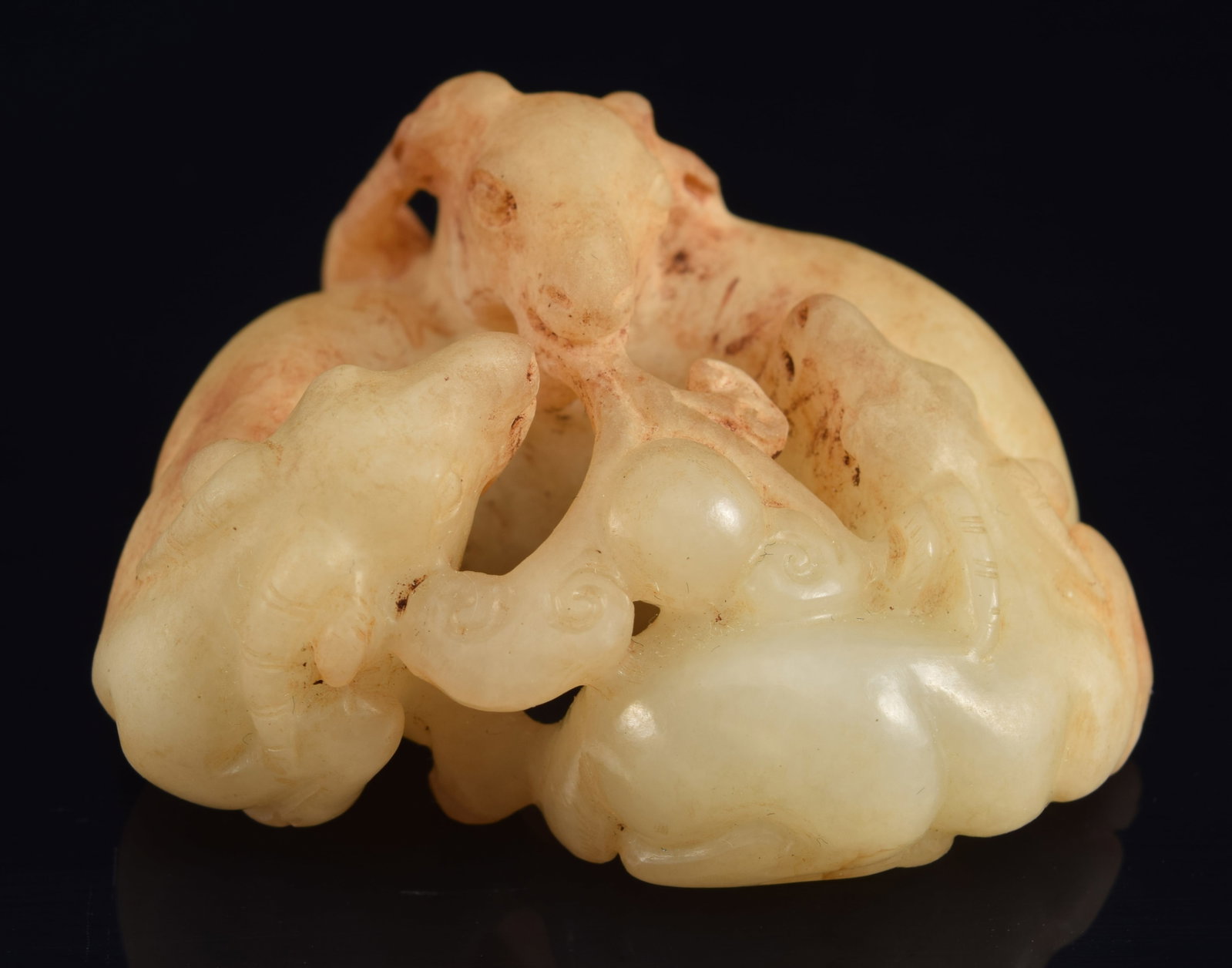 Jade carving. China. 19th century or earlier. Carved as group of 3 rams. Pale celadon stone with (1 of 6)