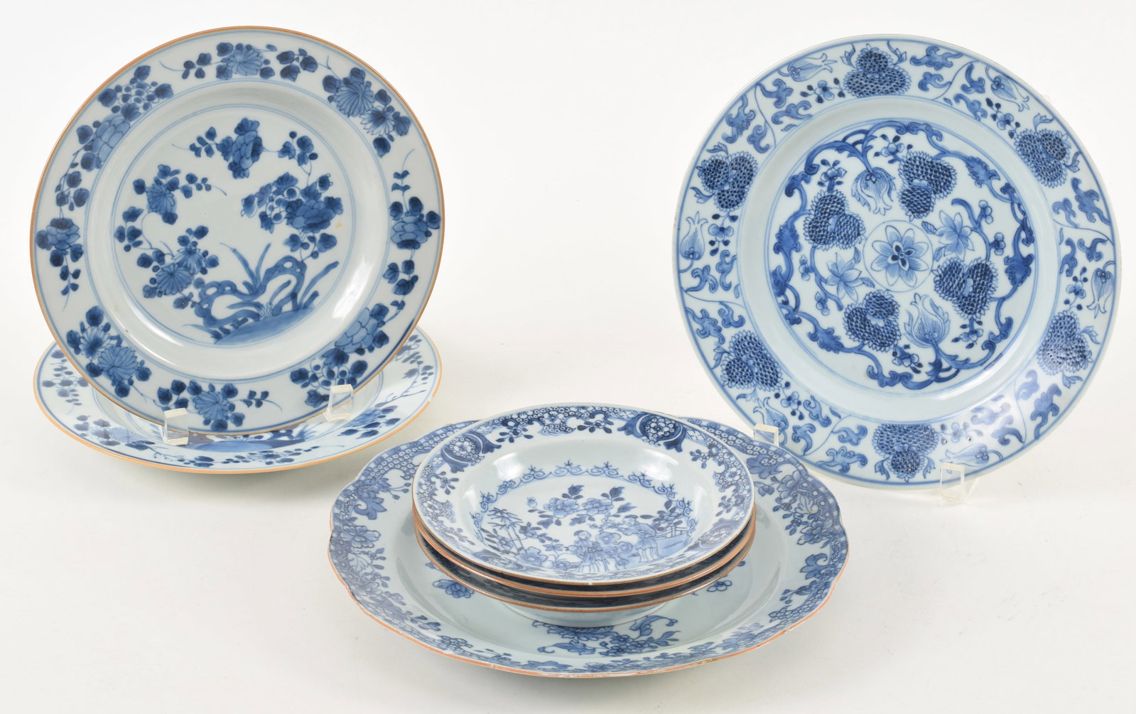 7 18th century Chinese export blue and white porcelain plates. Largest floral decorated, 10in (1 of 11)