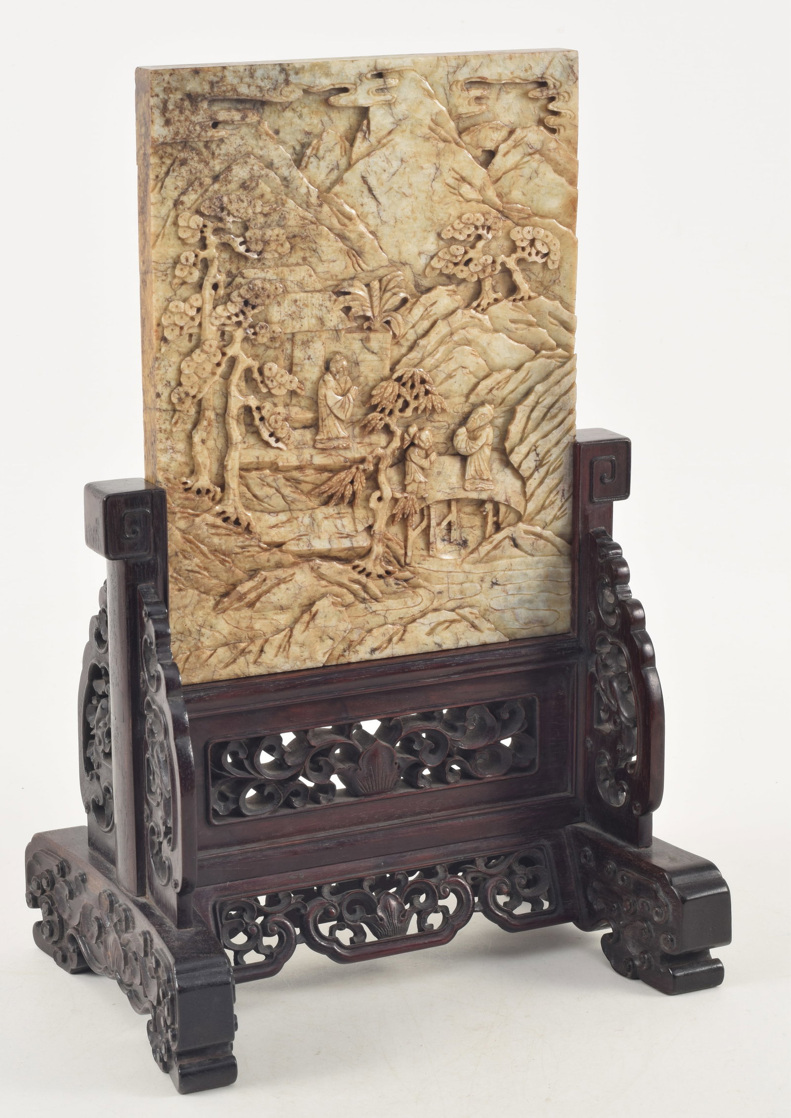 Jade table screen. China. 18th century. Both sides relief carved with figures in mountain grottos. (1 of 6)