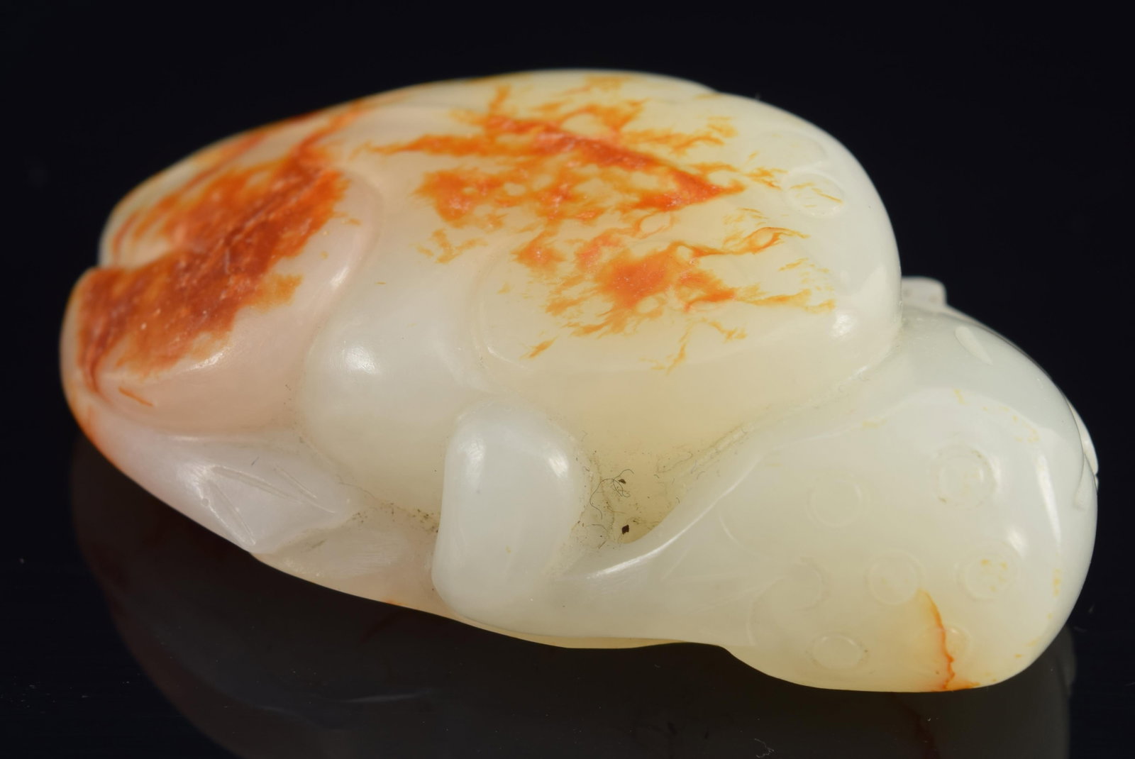 Jade pendant. China. 18th century. Pure white stone with russet markings. Carved as a frog. 2.25in. (1 of 8)