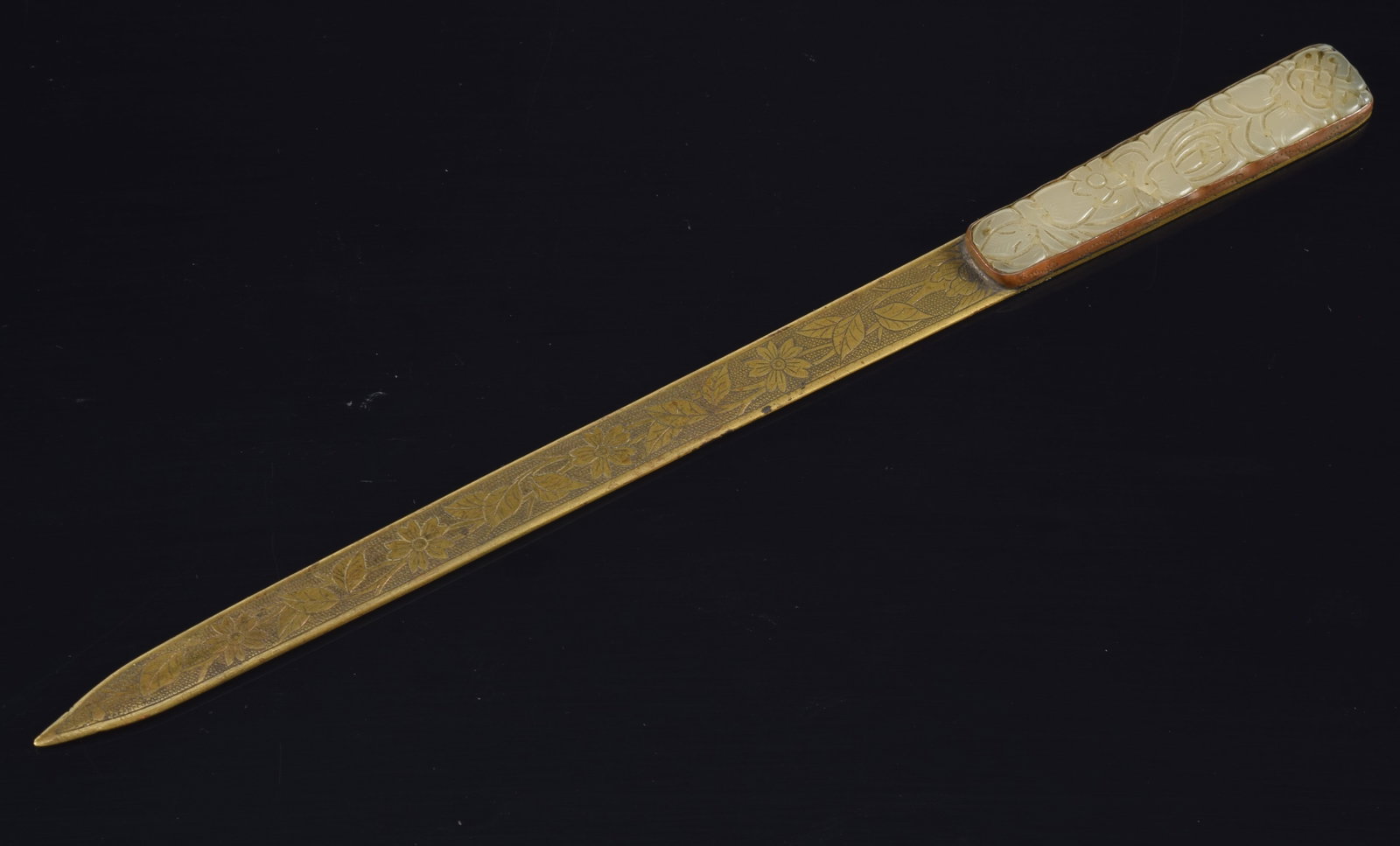19th/20th century jade mounted letter opener. Engraved floral decoration in metal. 9.25in length. (1 of 4)