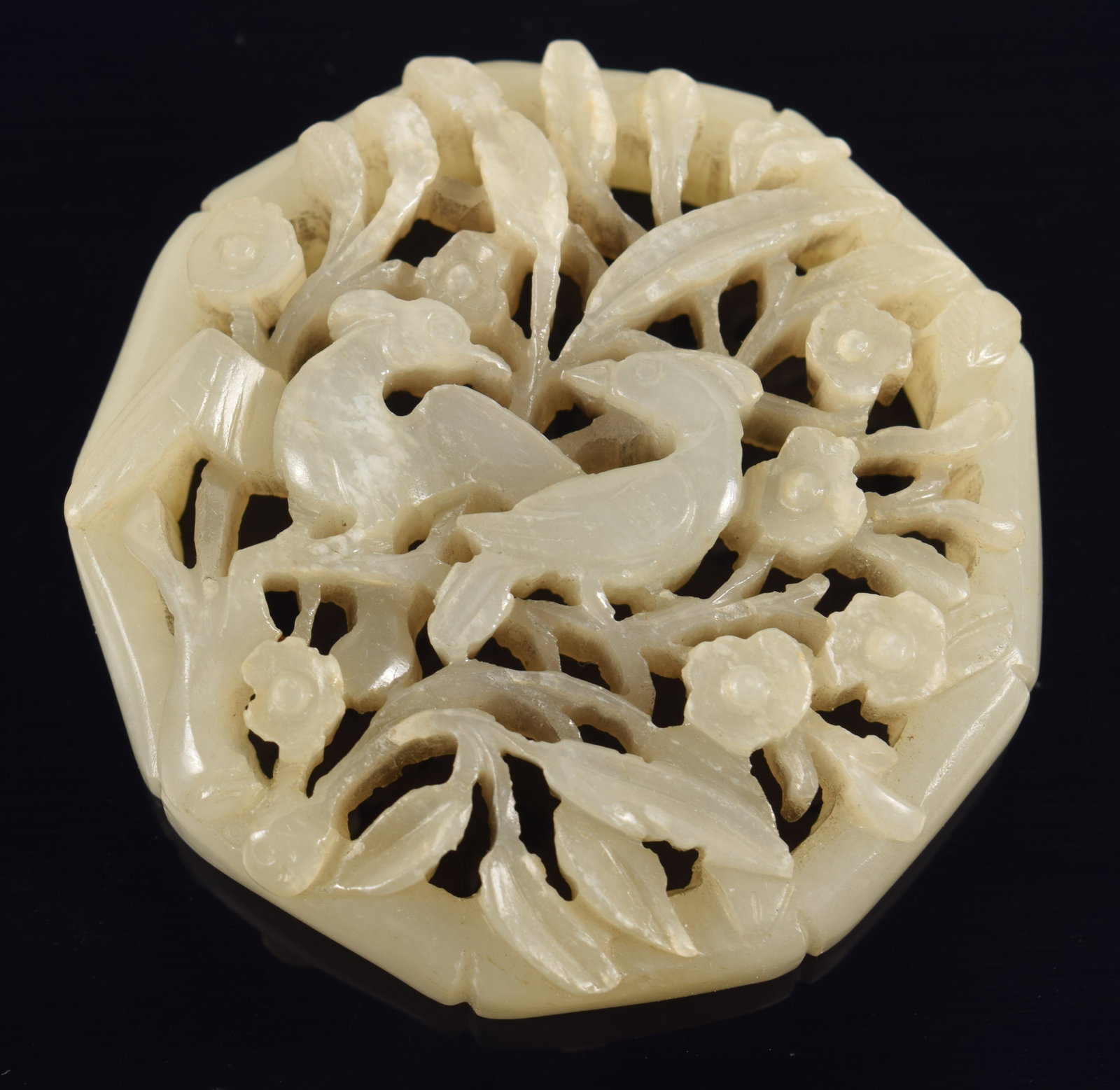 Jade pendant. China. Yuan period. Decoration of birds and flowering plants. 2in. (1 of 3)