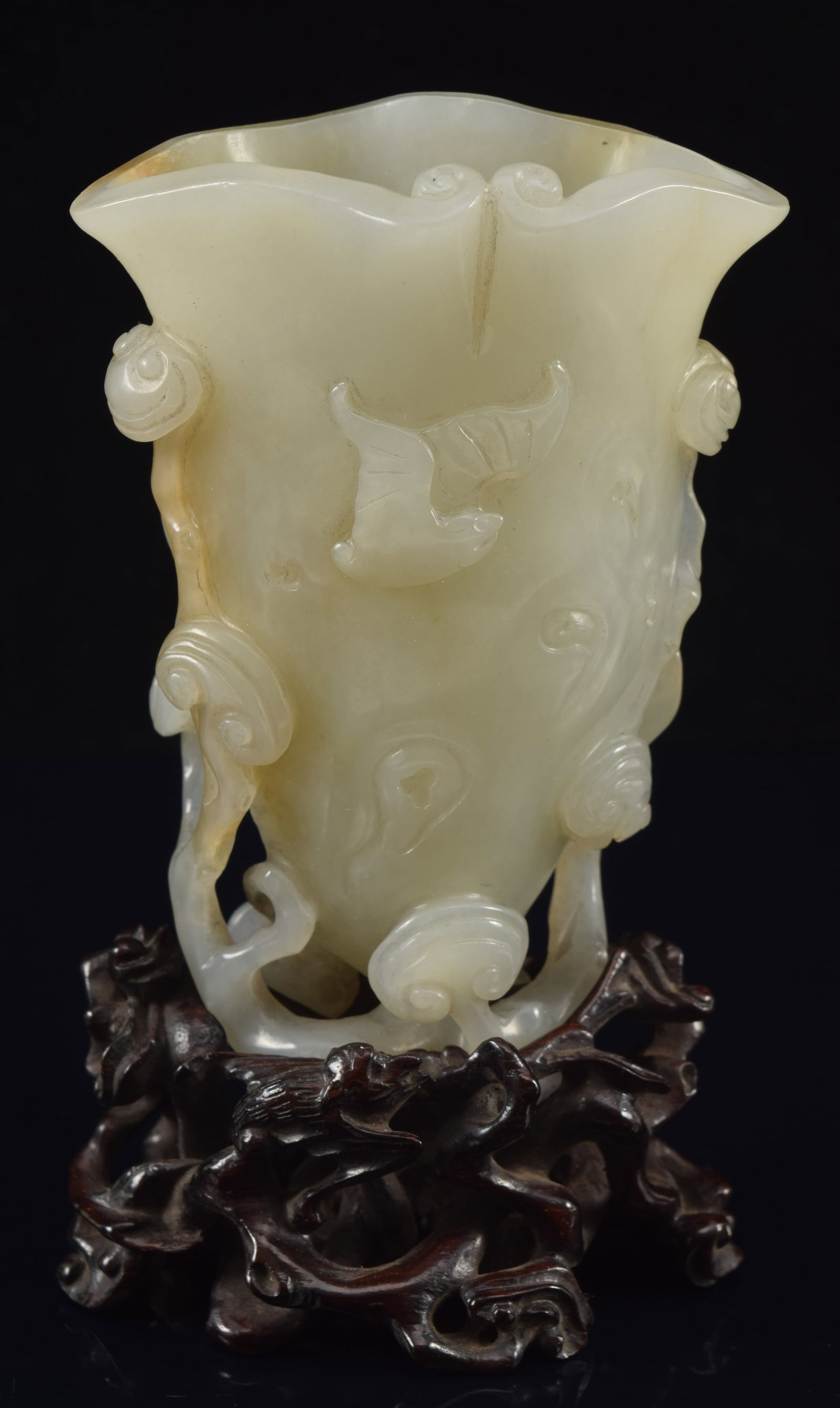 Jade cup. China. 19th century. Surface carved with ling chih and bats. Grey celadon color. 3.5in. (1 of 6)