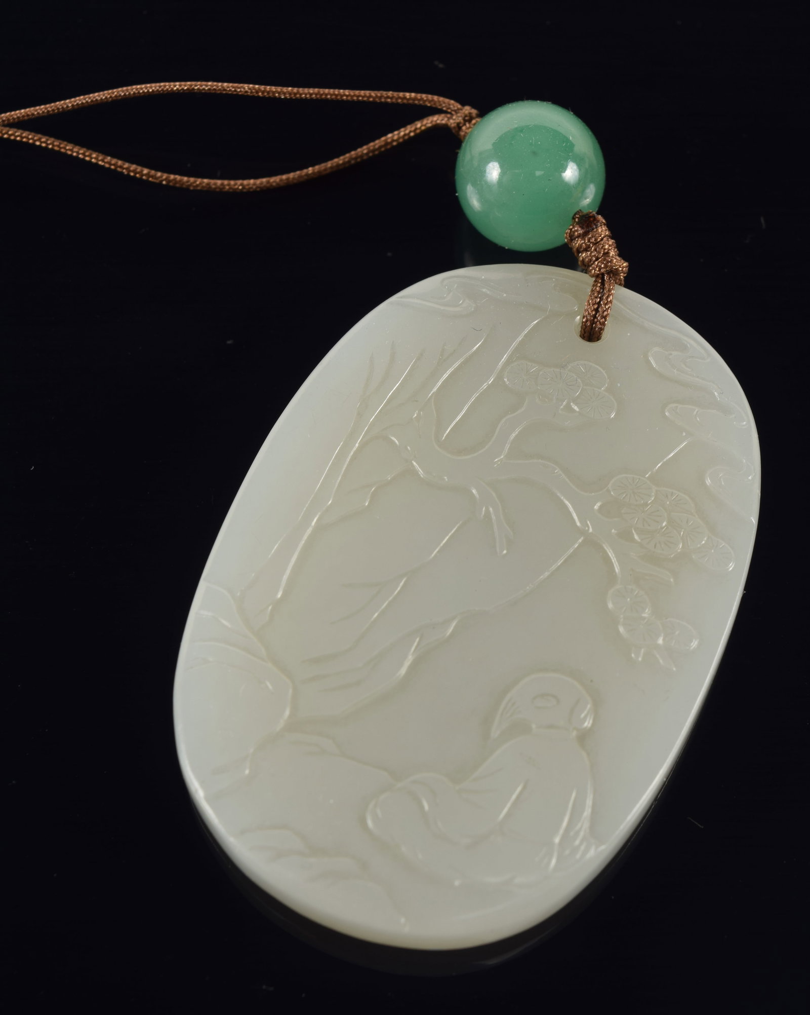 Oval jade pendant. China. 19th century. Scholar on one side, long inscription on the reverse. 2in.: Oval jade pendant. China. 19th century. Scholar on one side, long inscription on the reverse. 2in.