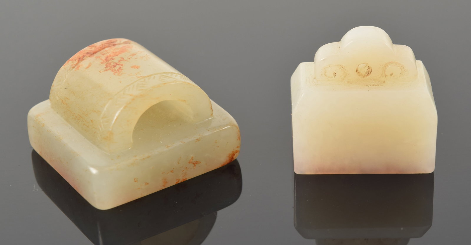 2 jade seals. China. 19th century or earlier. White jade. Each about 1in length. Inscriptions (1 of 3)