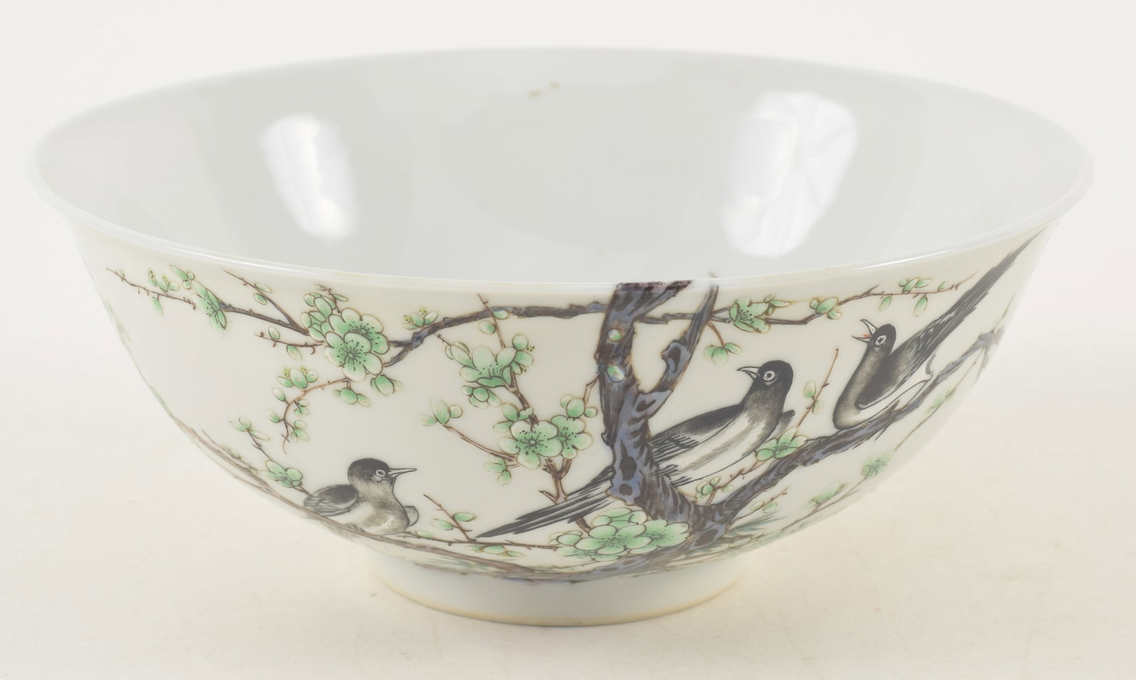 Porcelain bowl. China. 20th century. Hsien Feng mark. Decoration of magpies and flowering trees. 7 x: Porcelain bowl. China. 20th century. Hsien Feng mark. Decoration of magpies and flowering trees. 7 x 2.75in.
