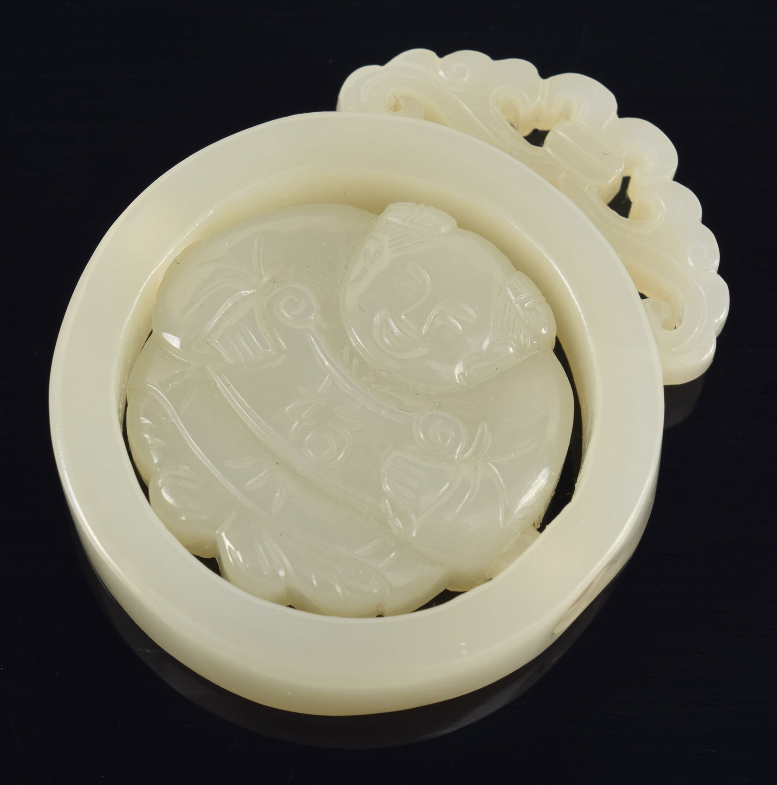 Jade pendant. China. 19th century. Small child inside a sphere with moveable elements. Pale celadon (1 of 4)