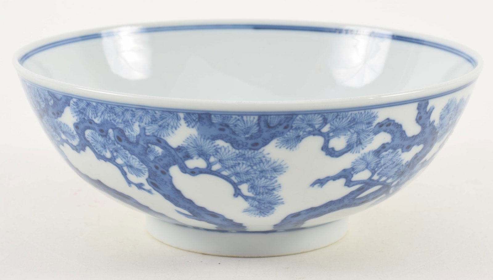 Chinese blue and white porcelain bowl with pine tree decoration. Guangxu mark on base. 8in diameter. (1 of 6)