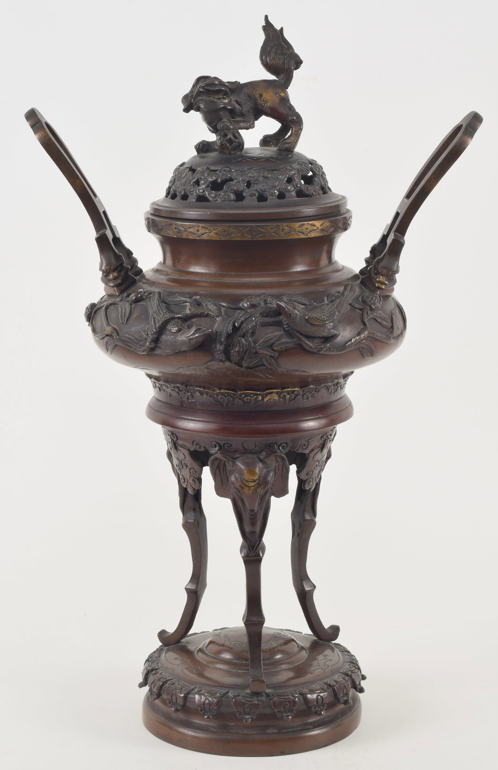 Japanese bronze tripod handled censer, late 19th/early 20th century. Elephant mask feet supporting a (1 of 10)