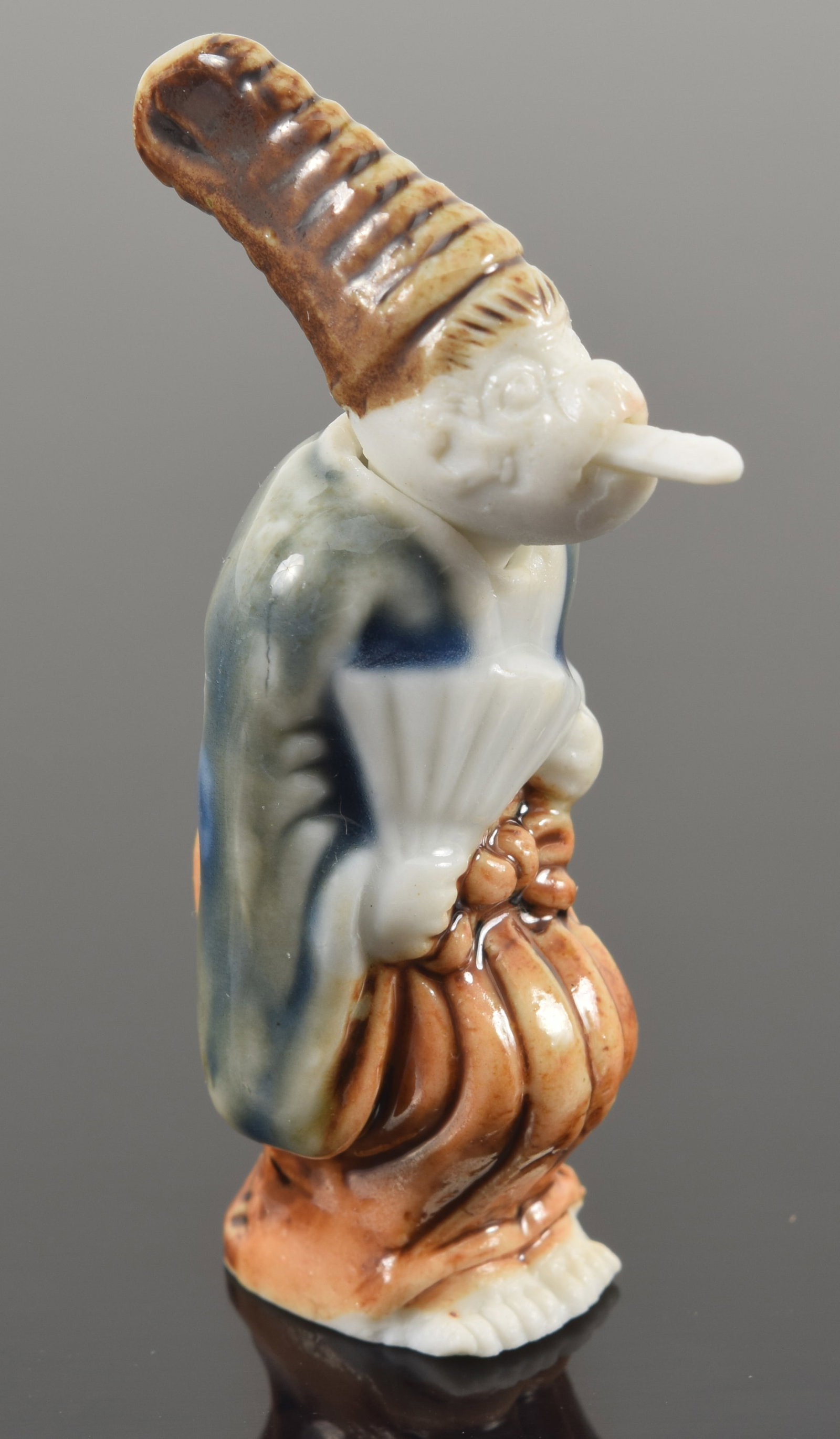 Japanese Hirado porcelain netsuke of a sanbosa dancing monkey with nodding head and retractable (1 of 6)