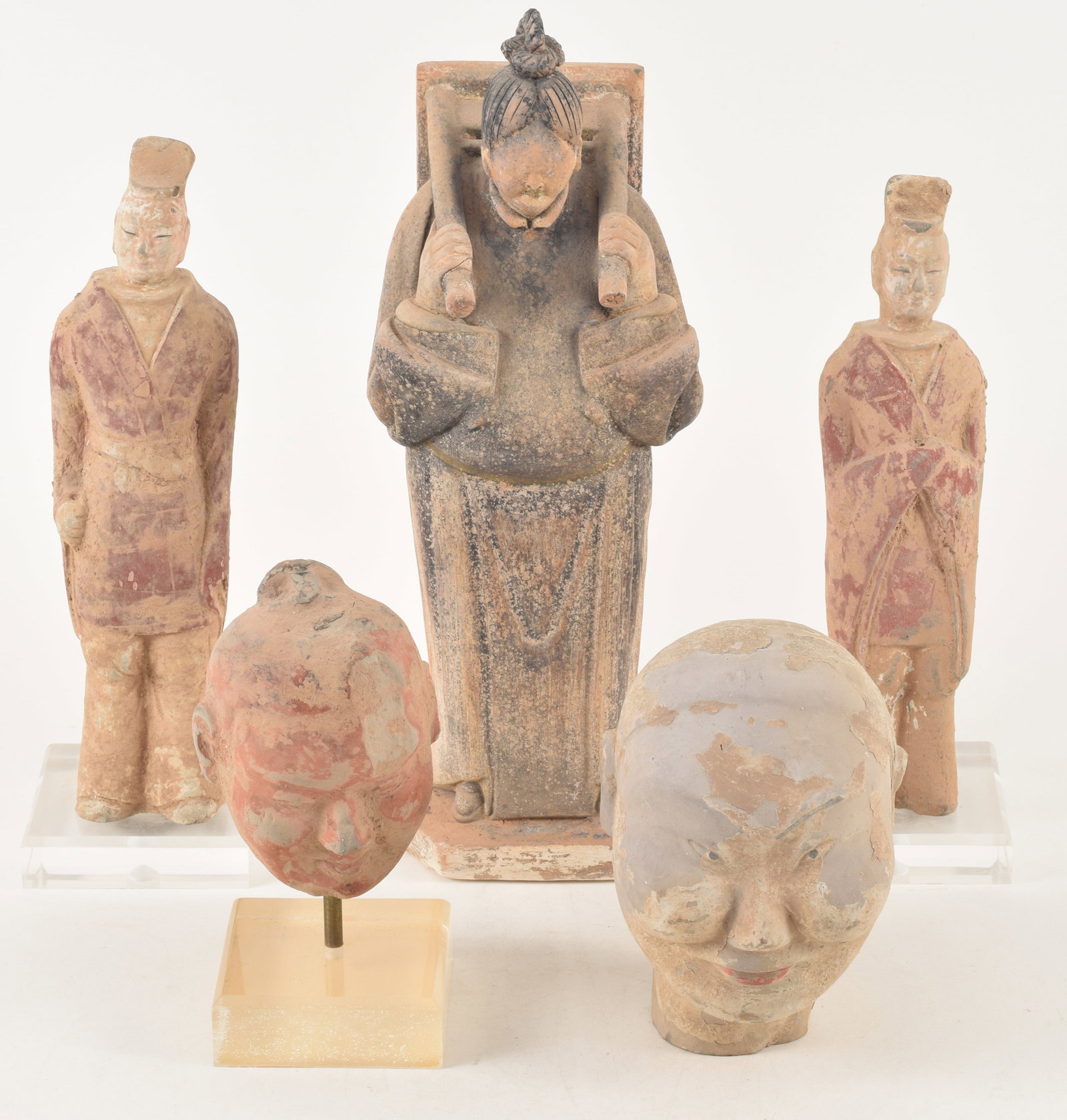 5 tomb figures. Han period. To include: 2 officials, 2 busts along with Ming period figure of a (1 of 11)