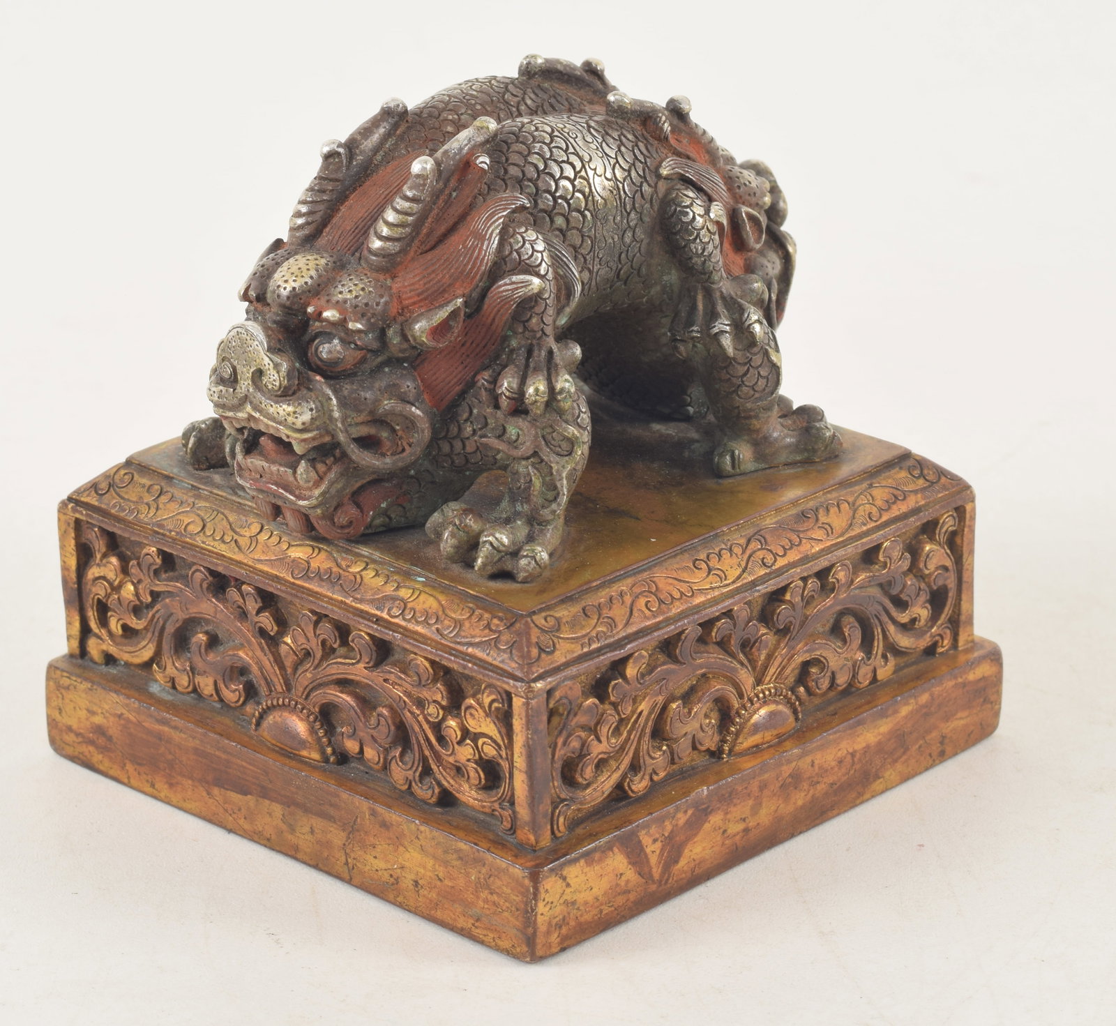 Sino-Tibetan seal. China. Early 20th century. Double dragon of silver on a gilt bronze base. Dual (1 of 5)