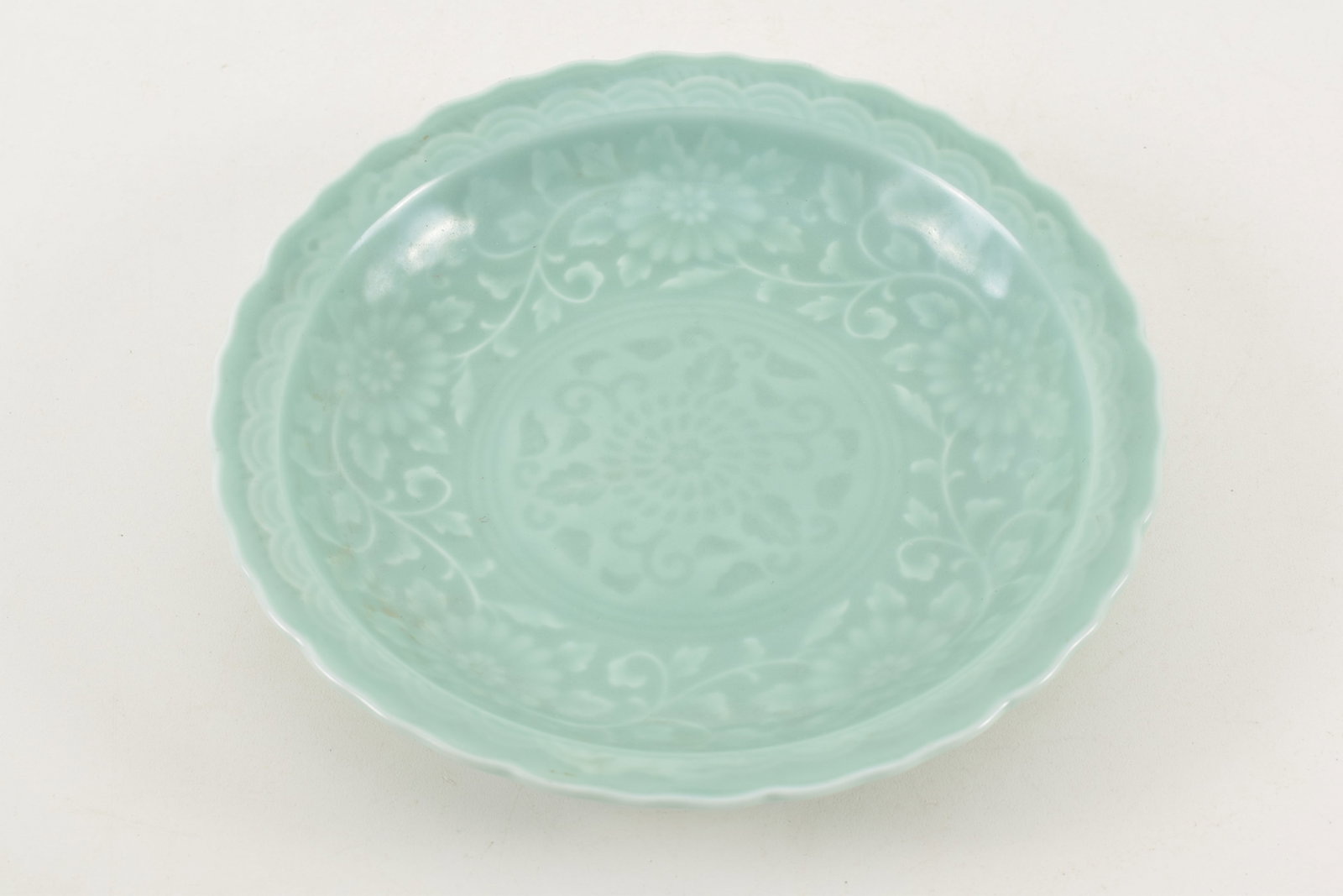 Chinese porcelain celadon dish with floral decoration. 20th century. Shaped edge. 7.25in diameter. (1 of 4)