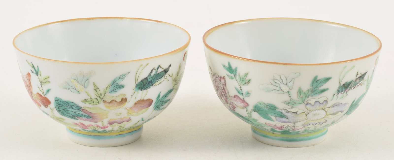 Pair of porcelain bowls. China. Early 20th century. Famille rose decoration of insects and flowers. (1 of 9)