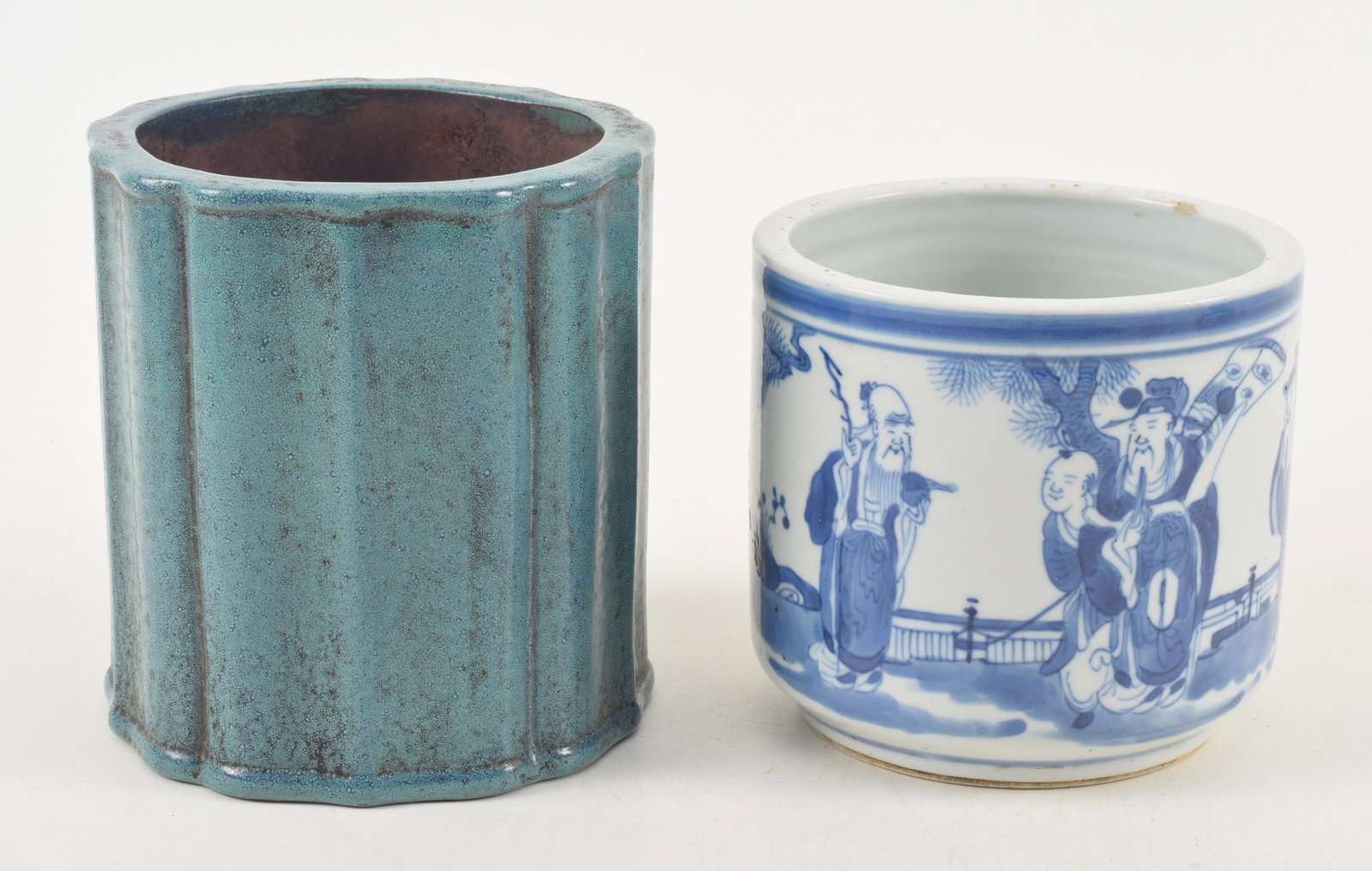 2 brush pots. China. Early 20th century. 1) Turquoise glazed yixing ware. Sculptured form. Mark on (1 of 9)