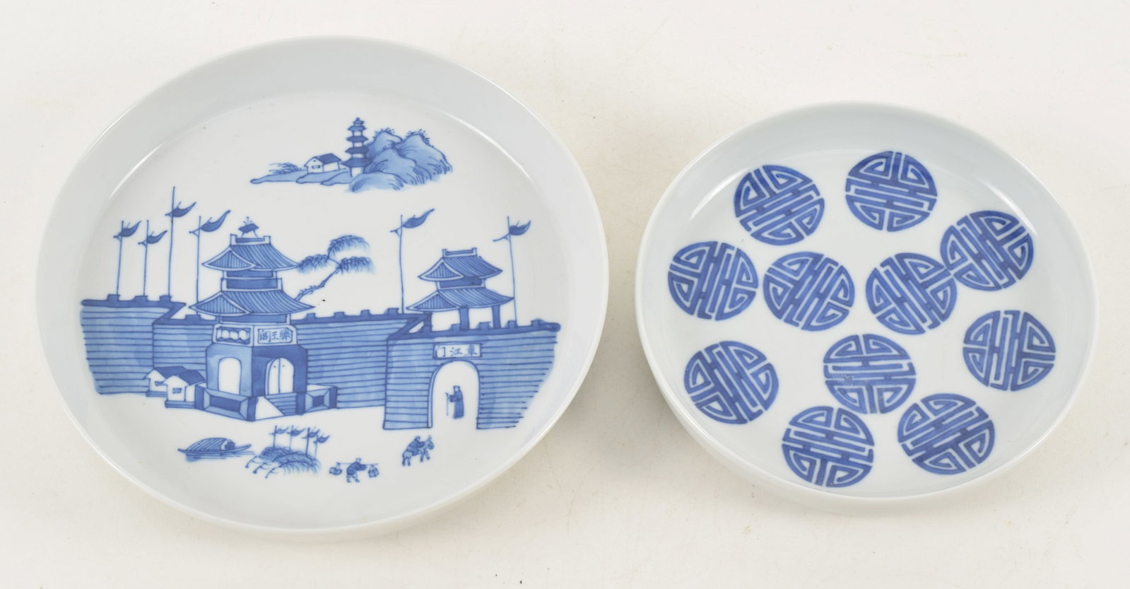 2 Chinese blue and white porcelain low dishes. 1 with landscape decoration and walls, the other with (1 of 4)