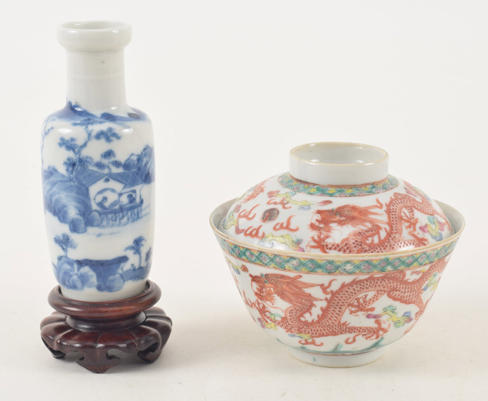 2 19th century Chinese porcelains. 1) Small underglaze blue rouleau form vase. 4.5in high. 2): 2 19th century Chinese porcelains. 1) Small underglaze blue rouleau form vase. 4.5in high. 2) Famille verte iron red dragon decorated covered dish. Hallmarked.