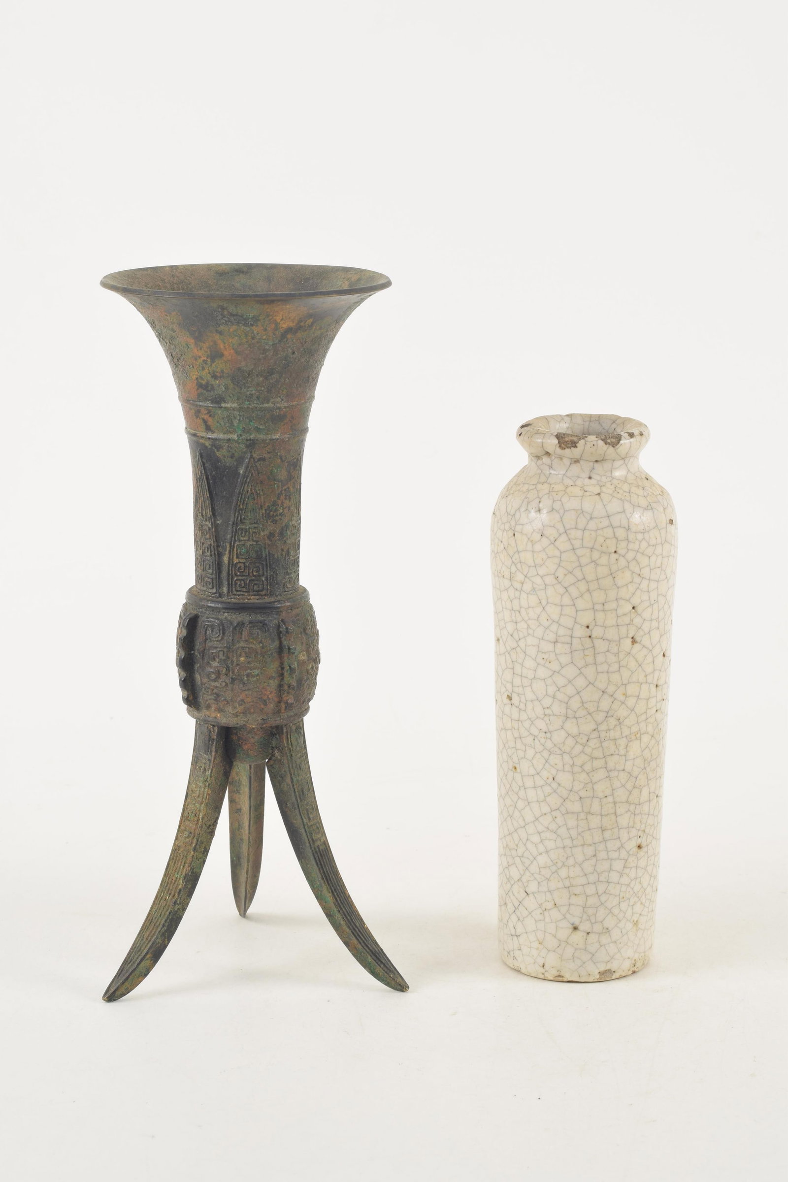 2 Asian items. 1) Archaic style tripod vase. 9.5in high. 2) Early crackle glaze cylindrical form (1 of 4)