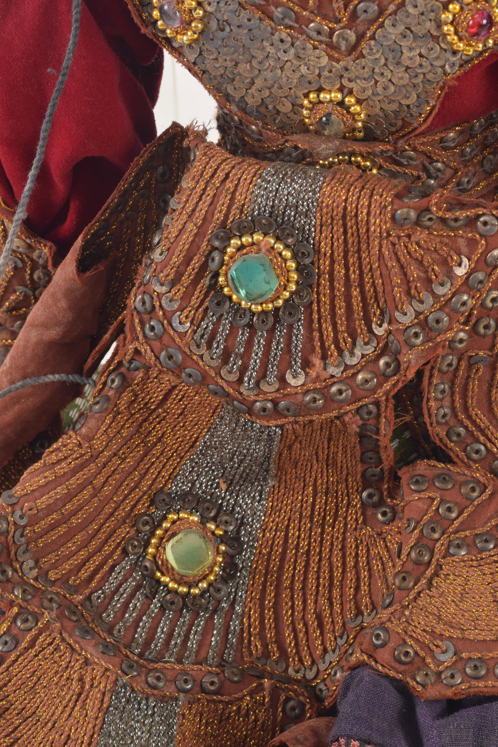 Puppet. Myanmar, ca 1950. Lacquered wooden body. Ornate later robes. About 22in length. - 4