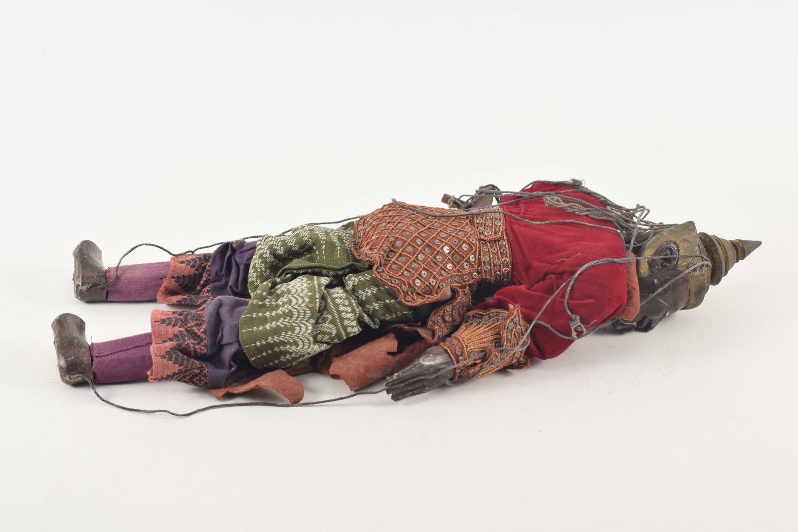 Puppet. Myanmar, ca 1950. Lacquered wooden body. Ornate later robes. About 22in length. - 5