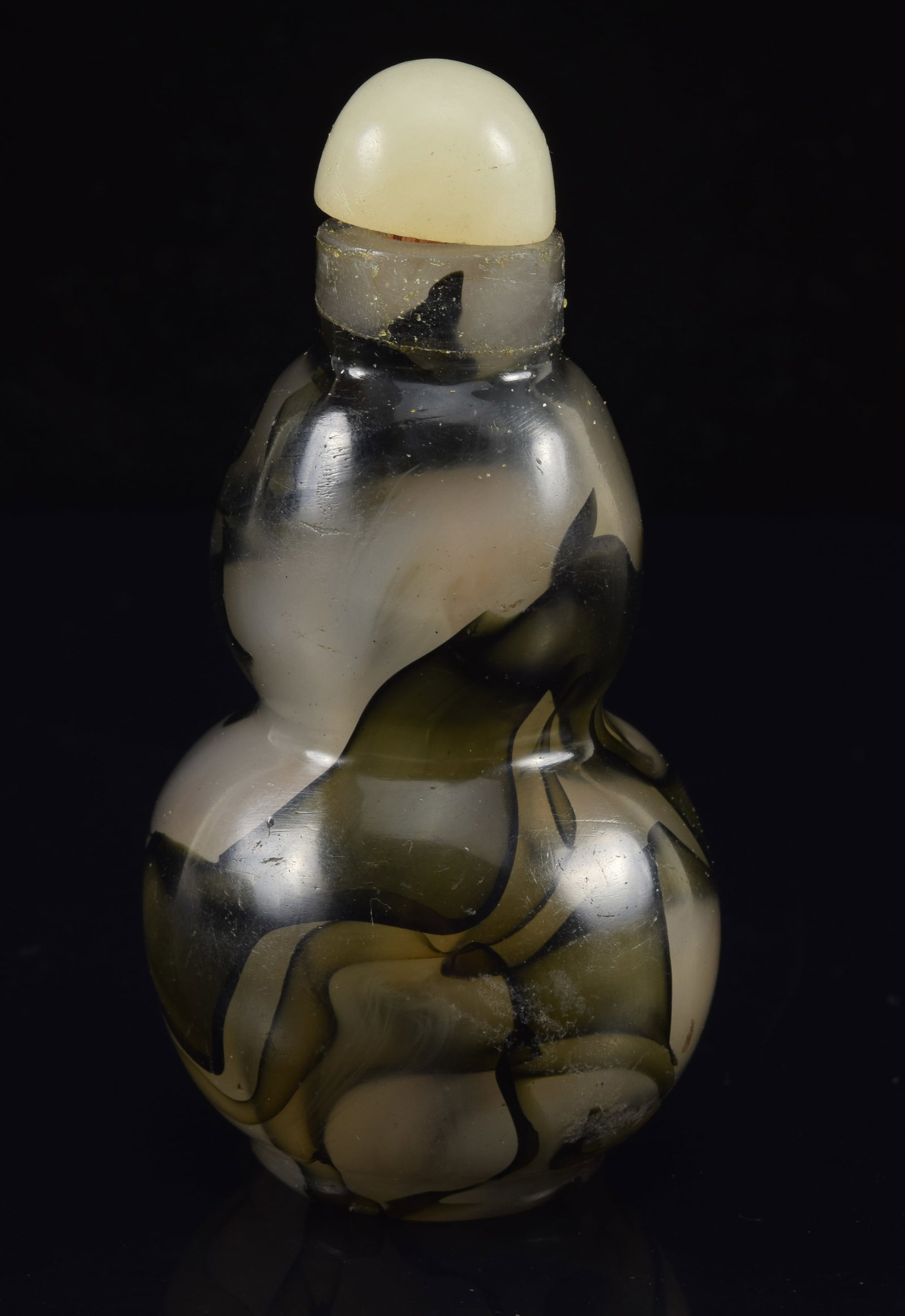 19th century Chinese realgar glass snuff bottle. Double gourd form with stone stopper. 3 1/8in high. (1 of 4)